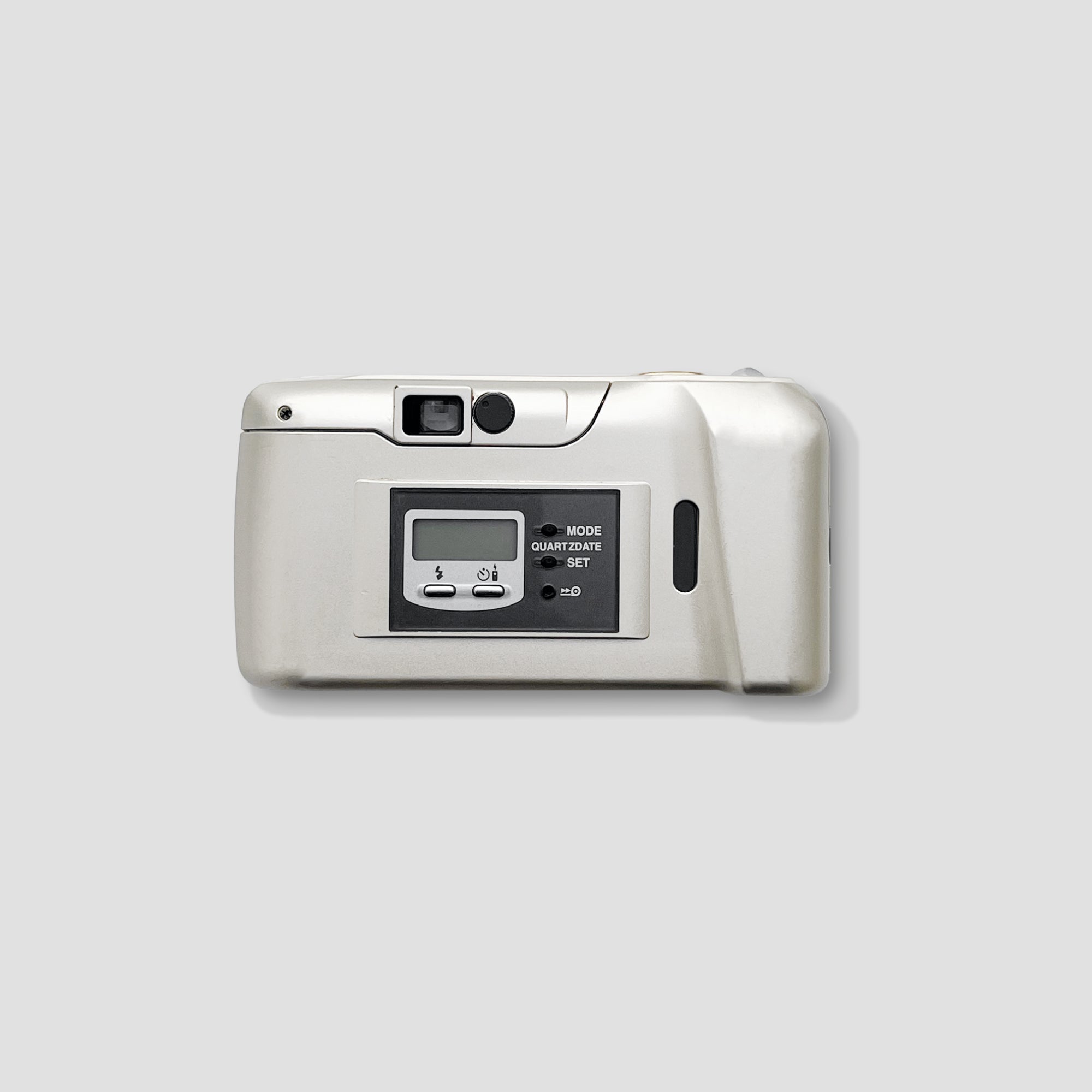 Front view of Olympus MJU II Zoom 115 compact film camera in champagne silver, showing its sleek design
