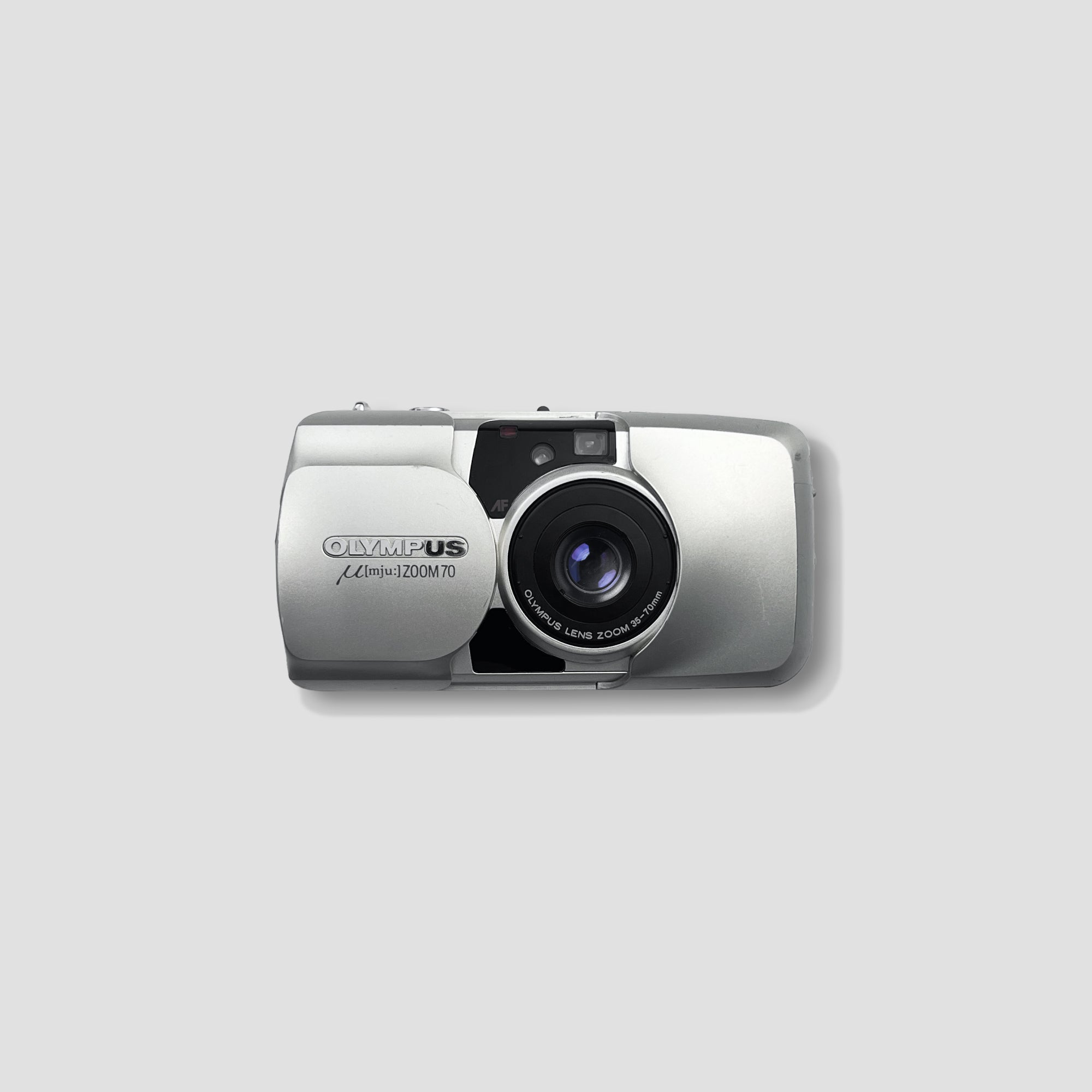 Front view of Olympus MJU 70 35mm film camera showcasing its sleek design