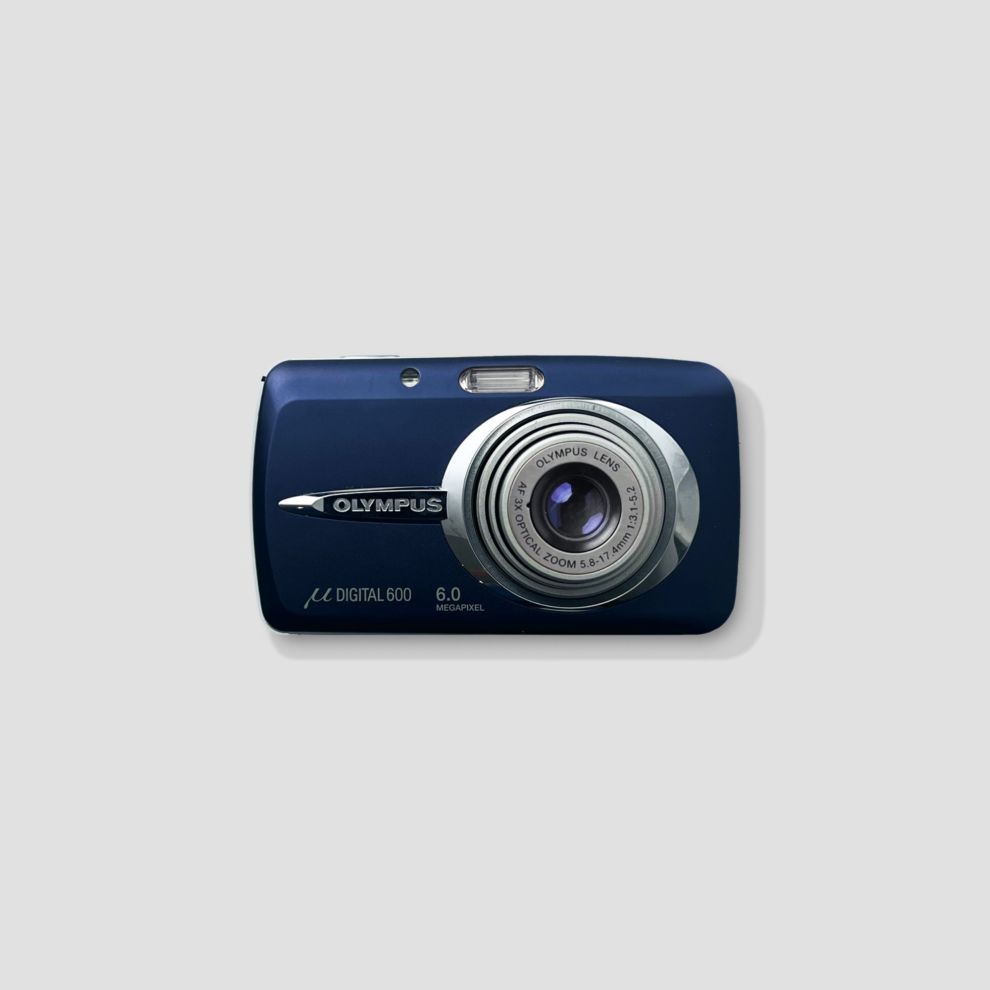 Olympus Mju Digital 600 compact camera with zoom lens on a table