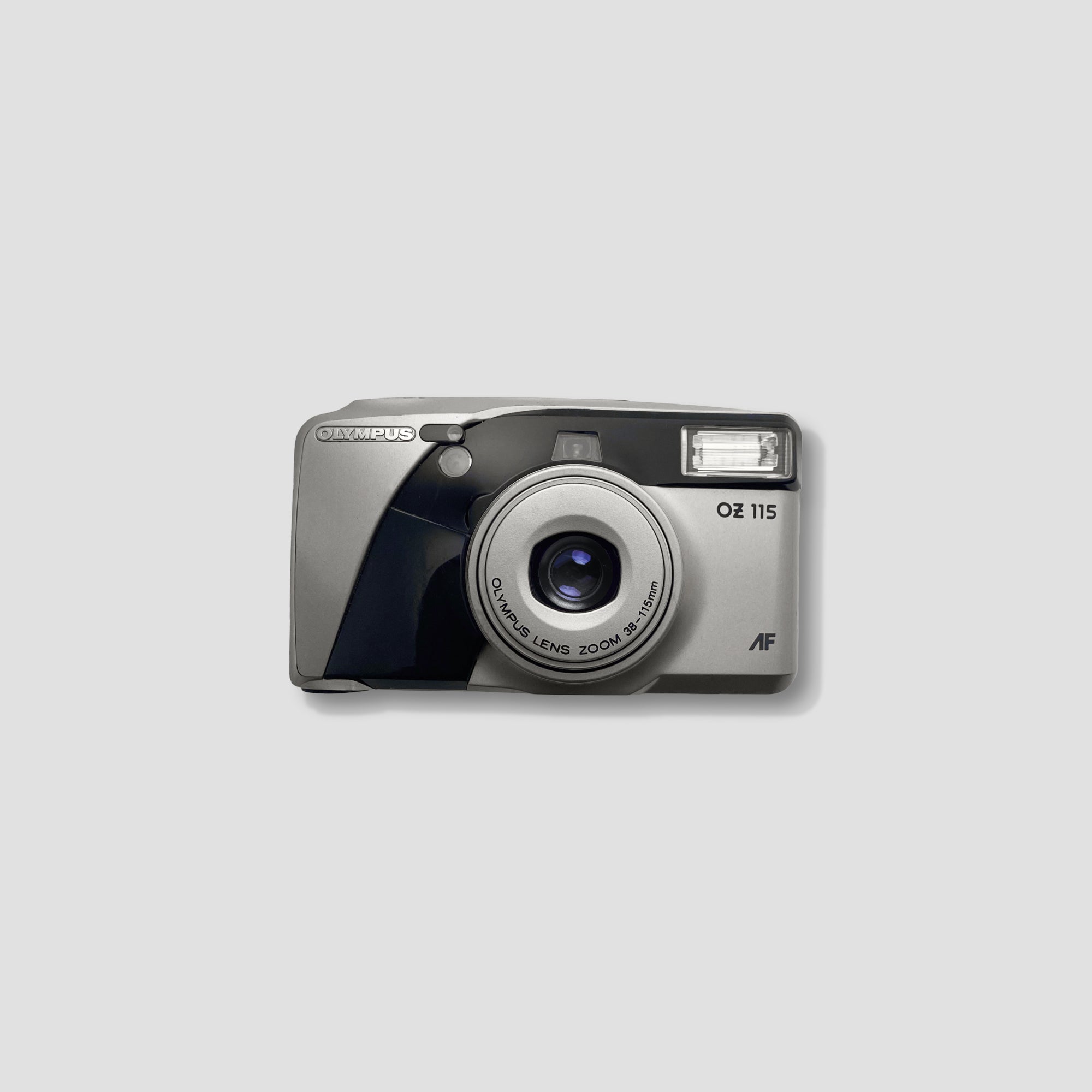 Olympus OZ 115 camera showcasing its sleek design and zoom lens.