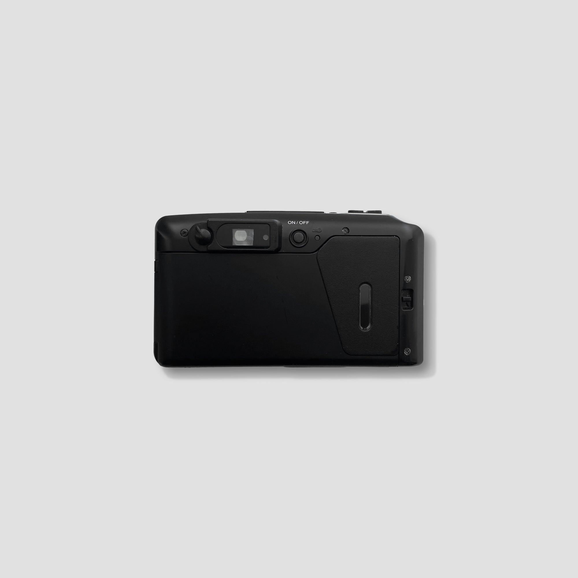 Close-up of the Olympus OZ 115 with its built-in flash and autofocus features.