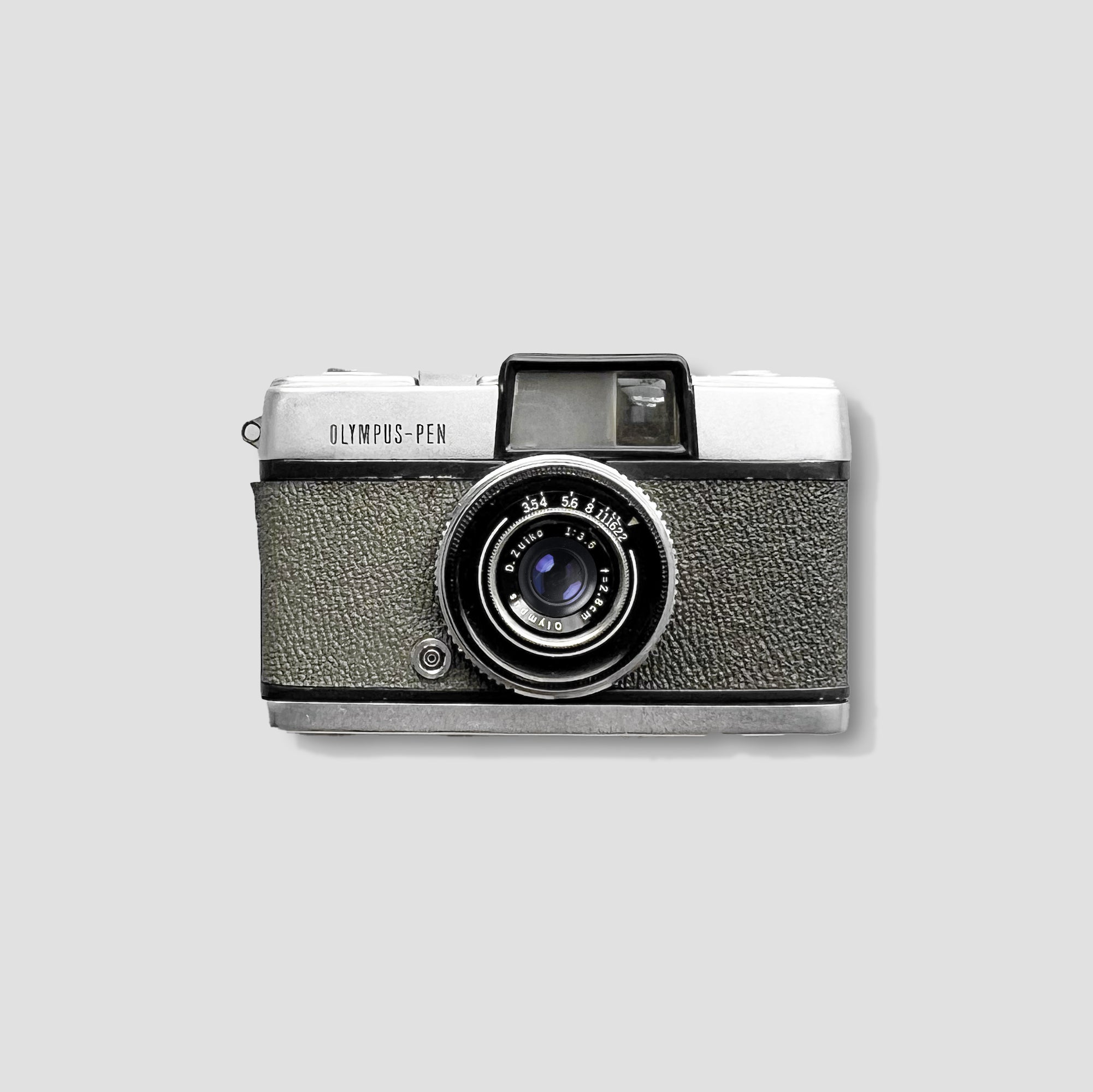 Olympus Pen vintage compact film camera front view showing lens and viewfinder