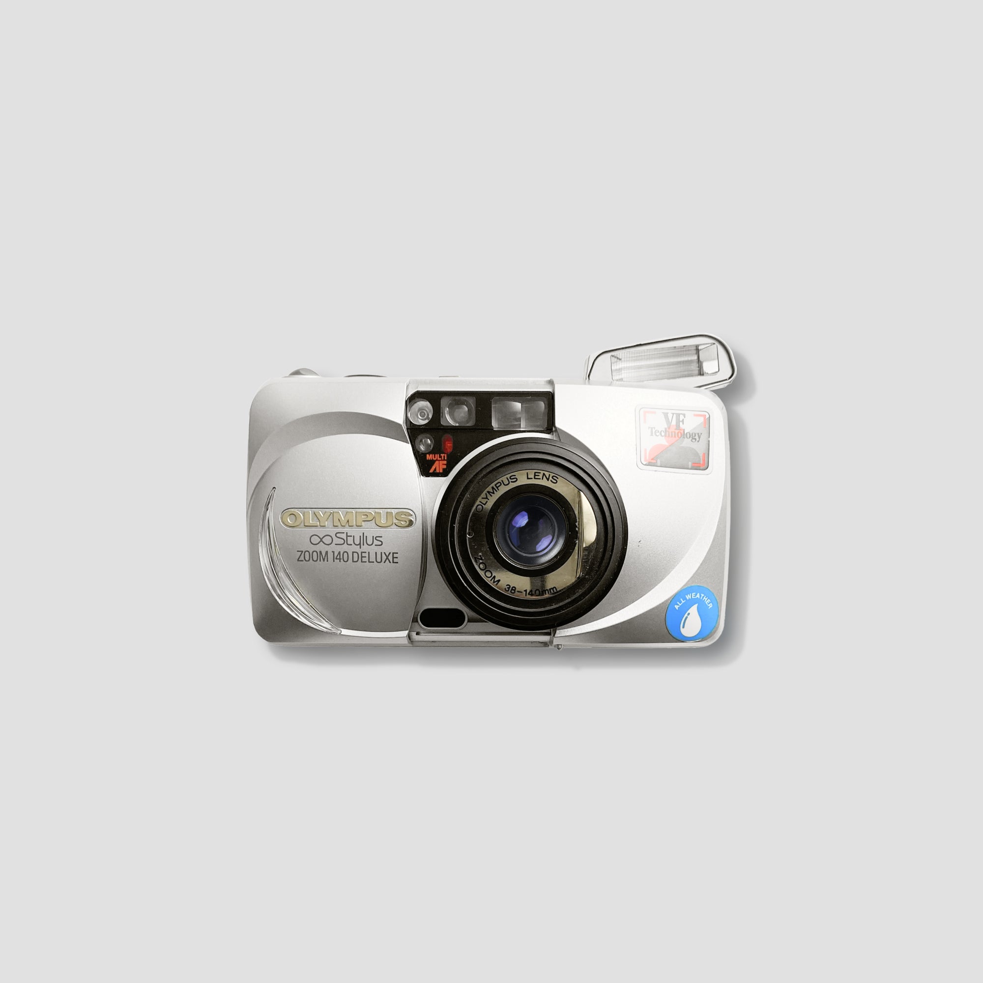 Close-up of the Olympus MJU Zoom 140 compact camera showcasing its sleek design and zoom lens.