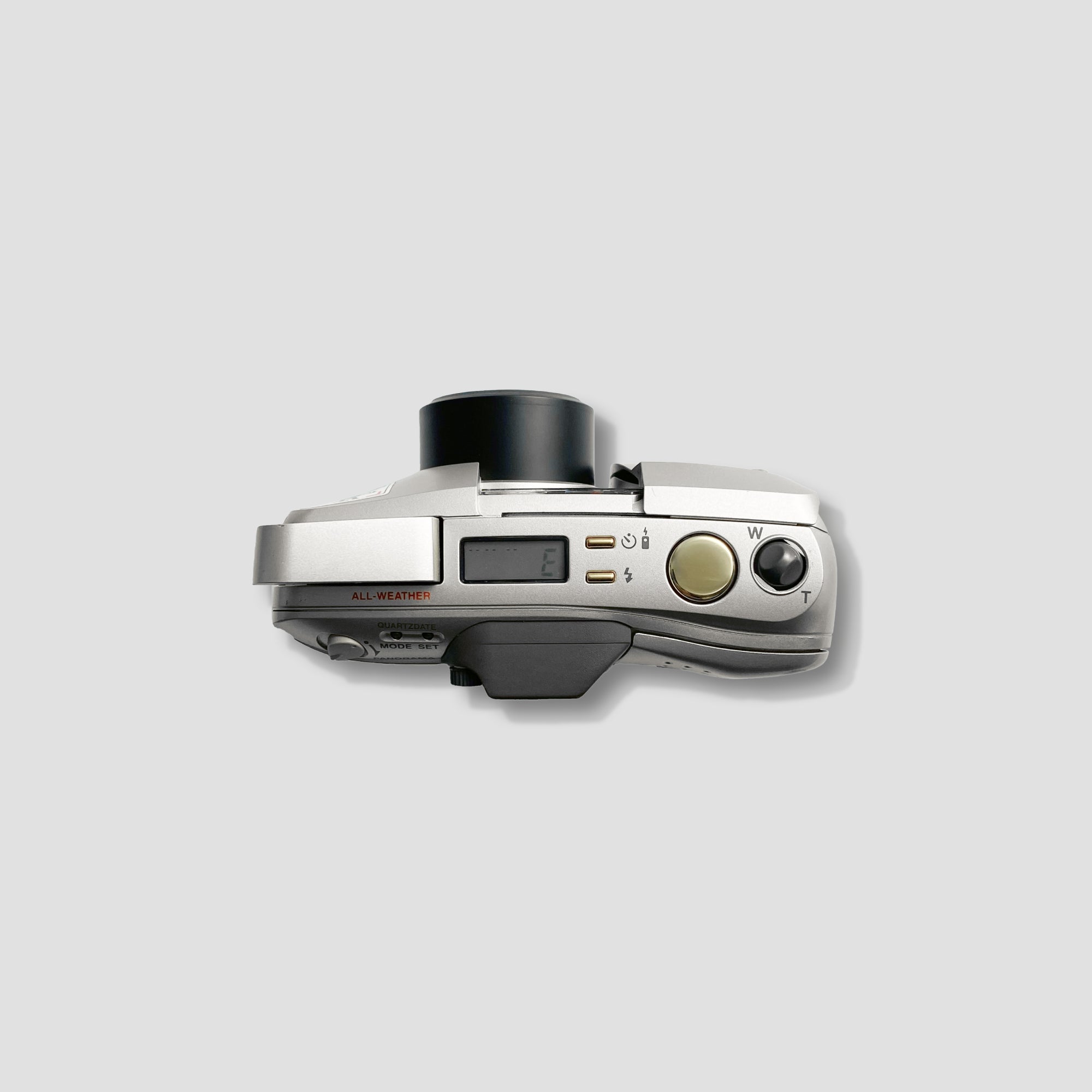 Detailed view of the Olympus MJU Zoom 140s zoom lens, highlighting its capabilities for various photography styles.