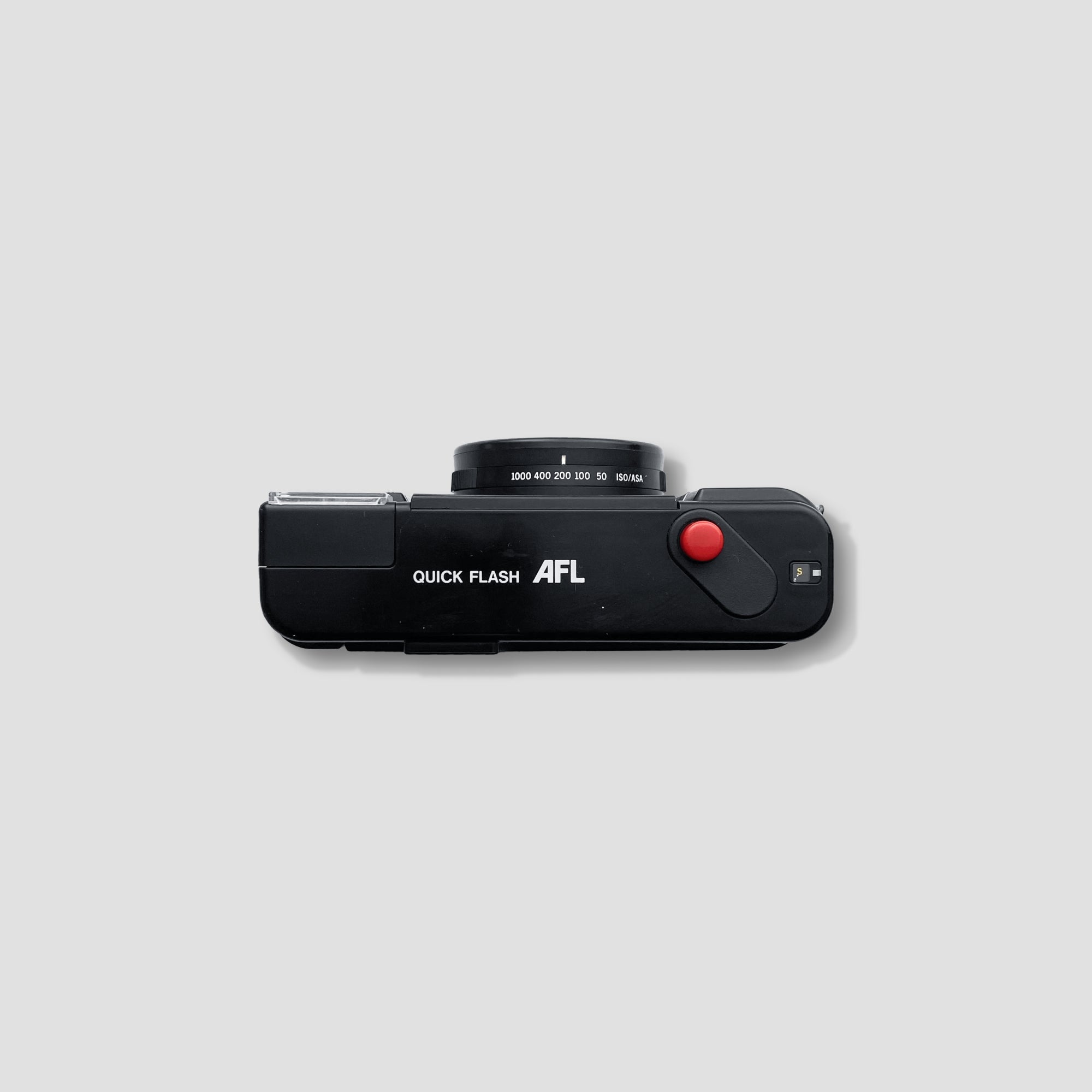 Close-up of the Olympus camera lens and flash feature