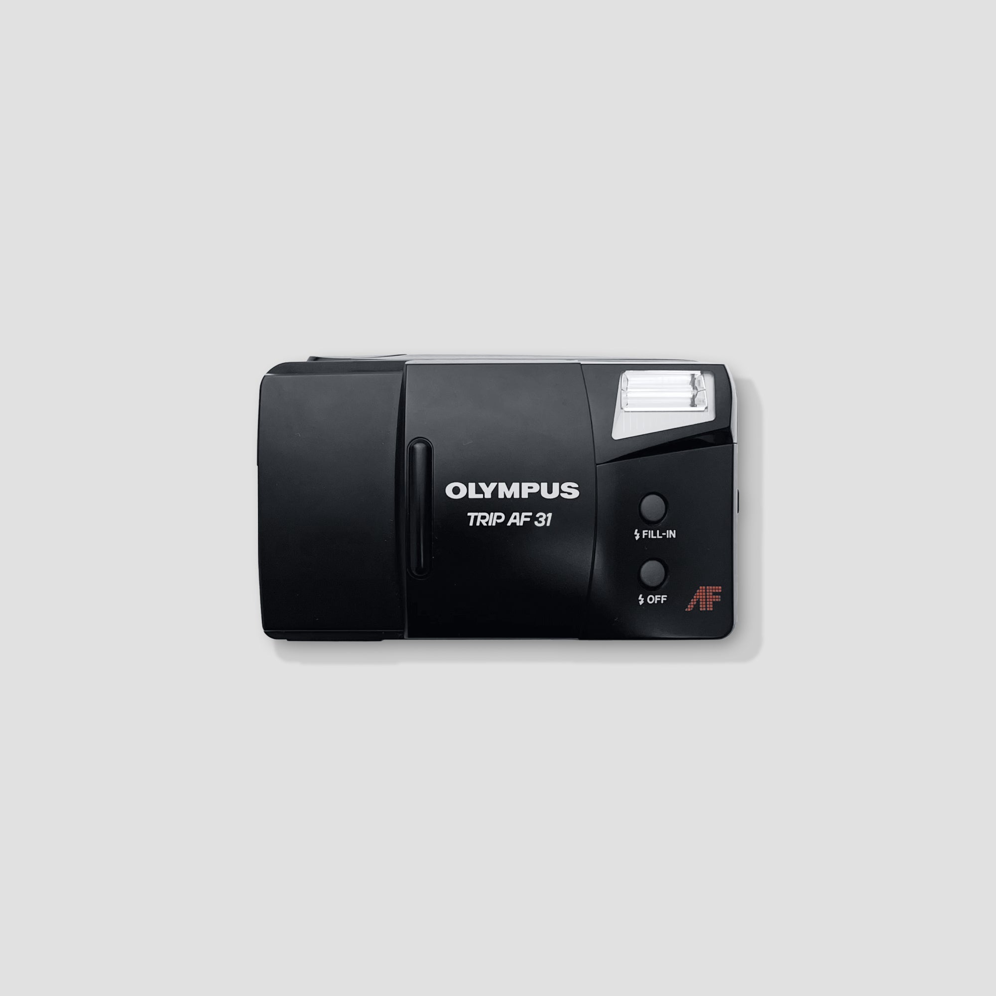 Front view of Olympus Trip AF 31 compact 35mm film camera with lens