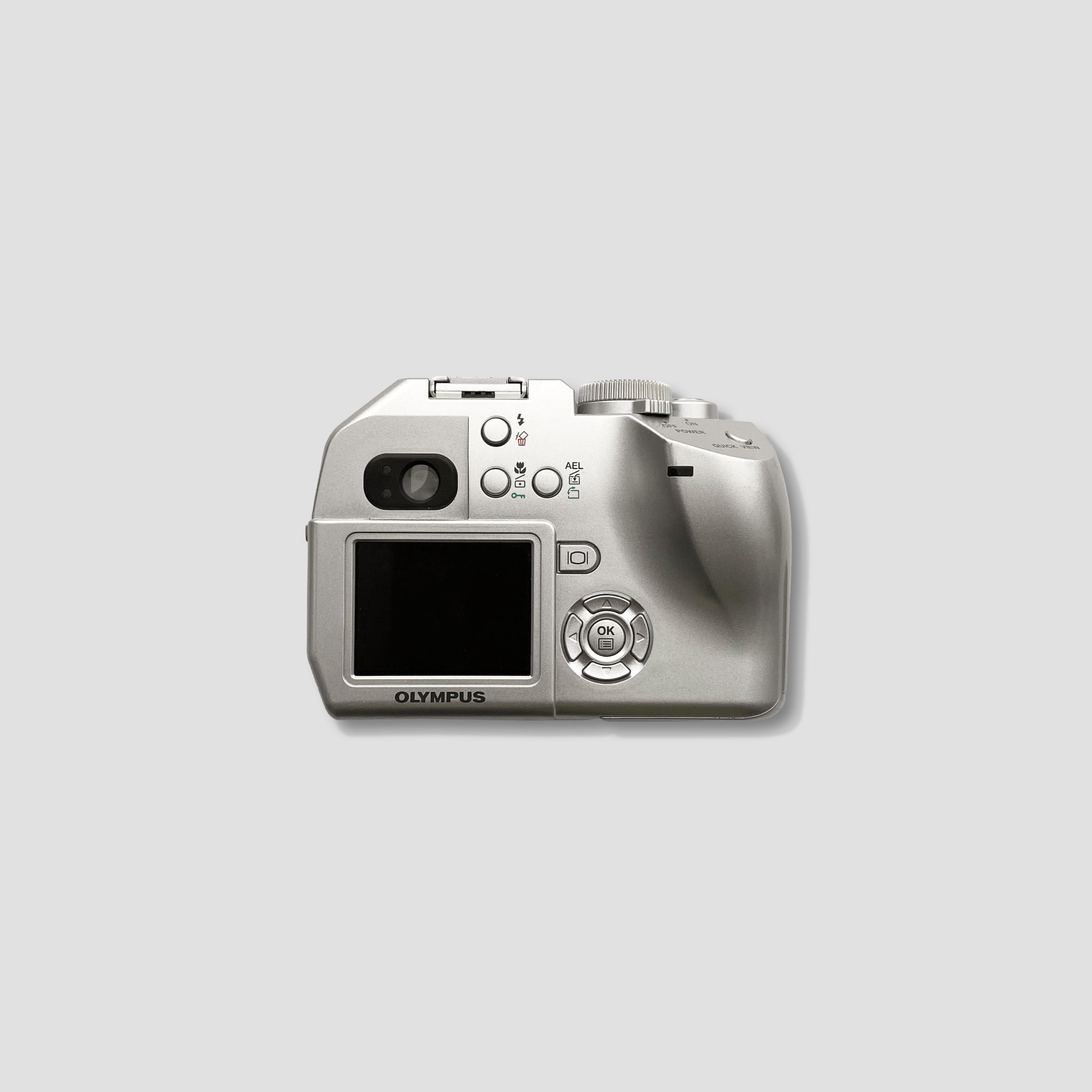 Front view of the Olympus Camedia C-5000 digital camera showing lens and buttons