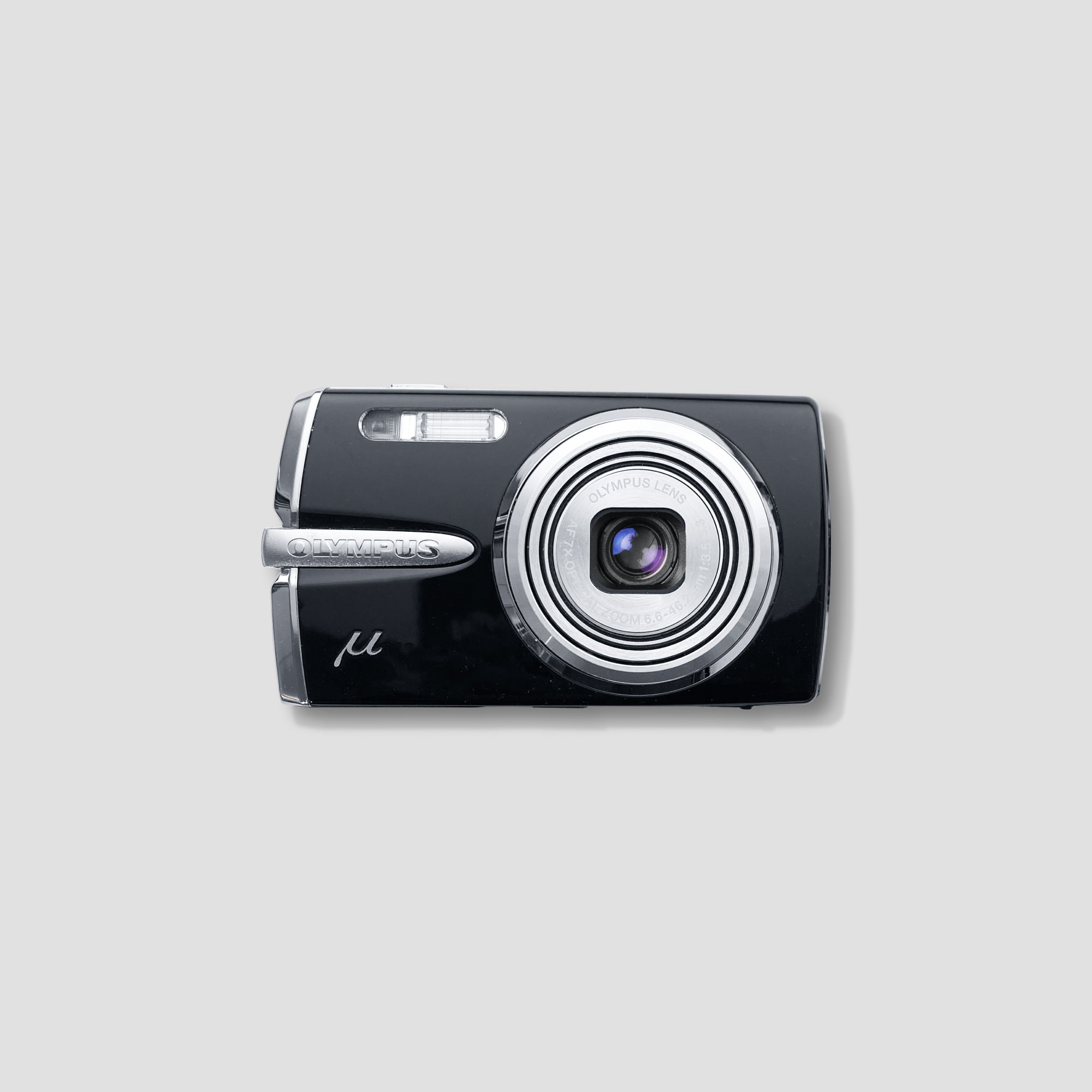 Front view of the Olympus Mju 1020 compact digital camera showcasing its sleek design.