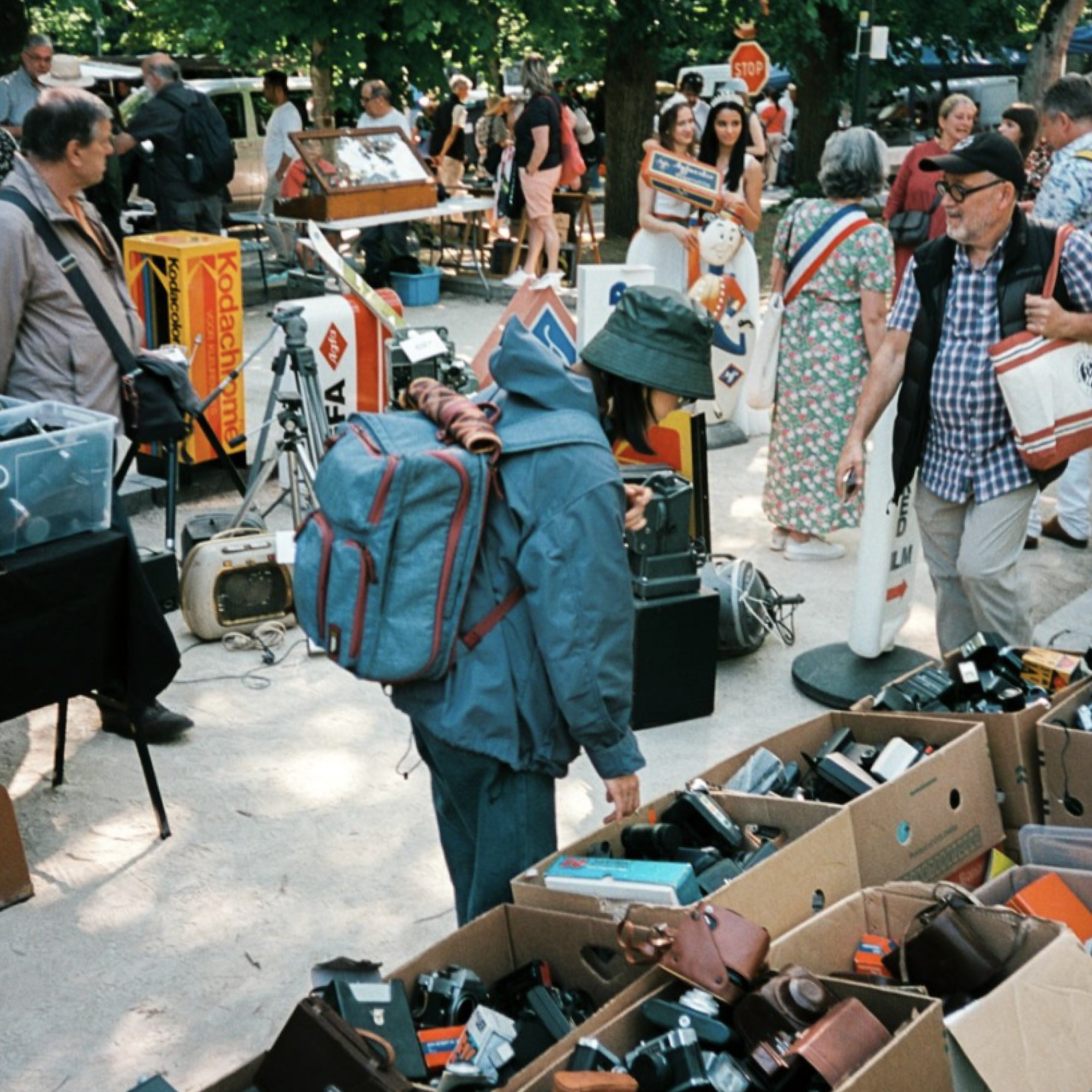 Photographer using 35mm film in bright sunlight for travel shots