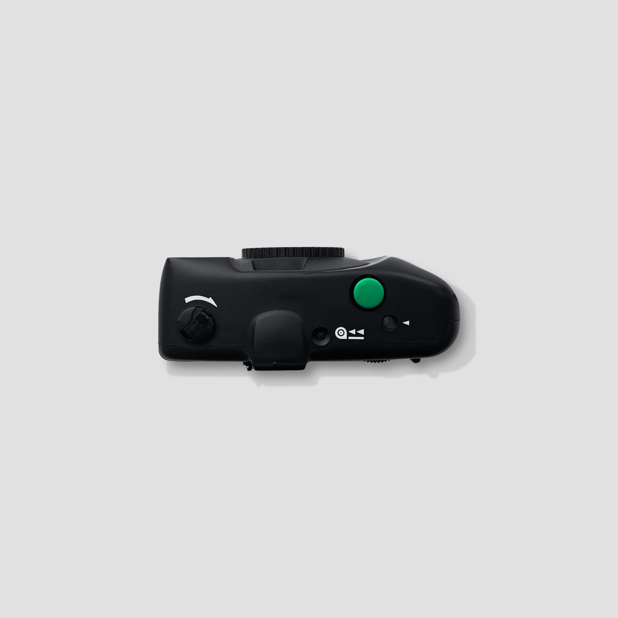 User holding the fixed lens camera outdoors for panoramic photography