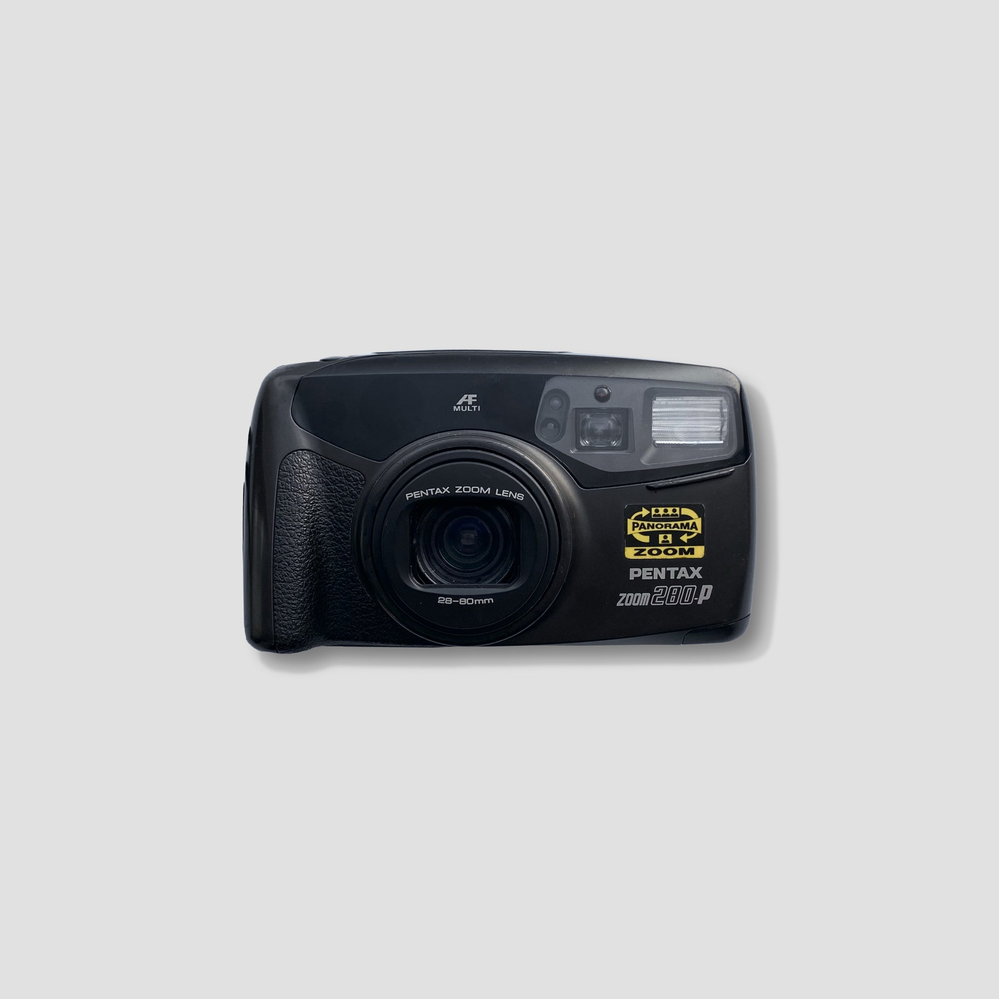 Pentax Zoom 280-P camera with zoom lens on travel tripod