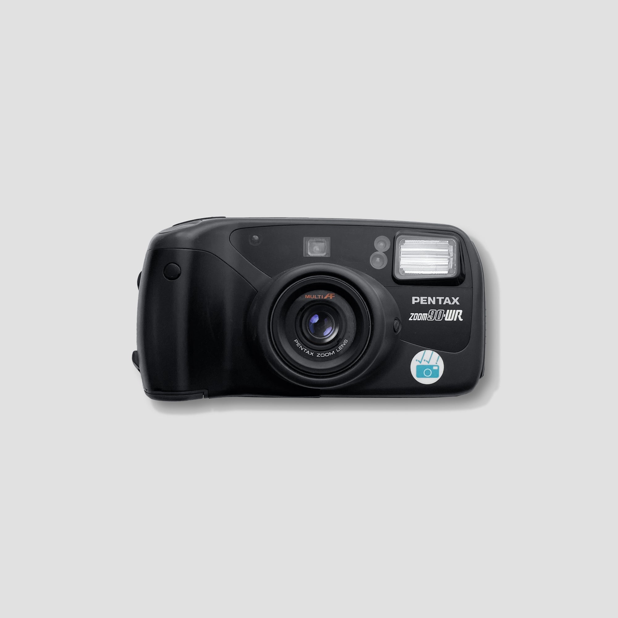 Front view of Pentax Zoom 90 WR showing its compact size and zoom lens