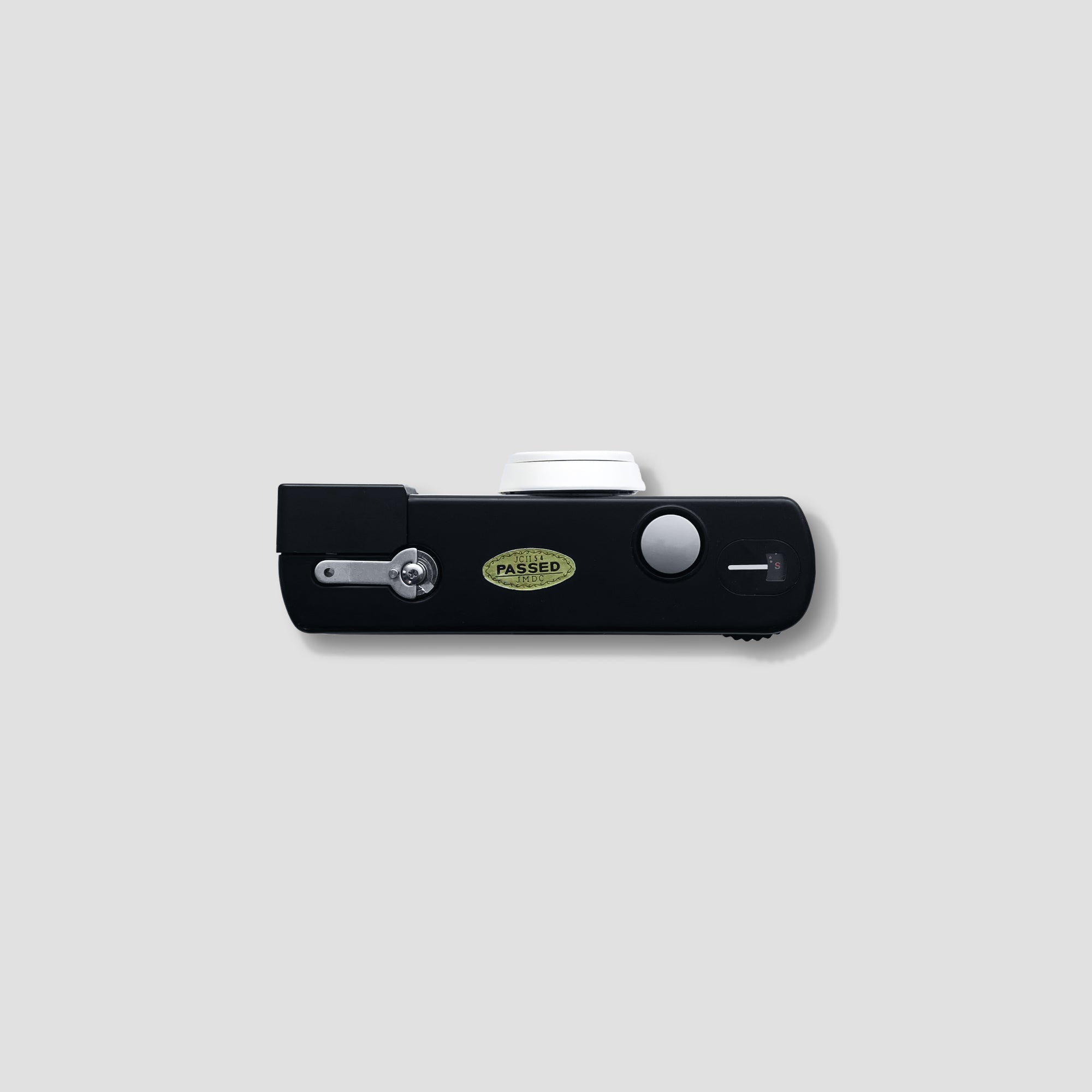 Side view of the Petri PX5F highlighting its compact, lightweight design.