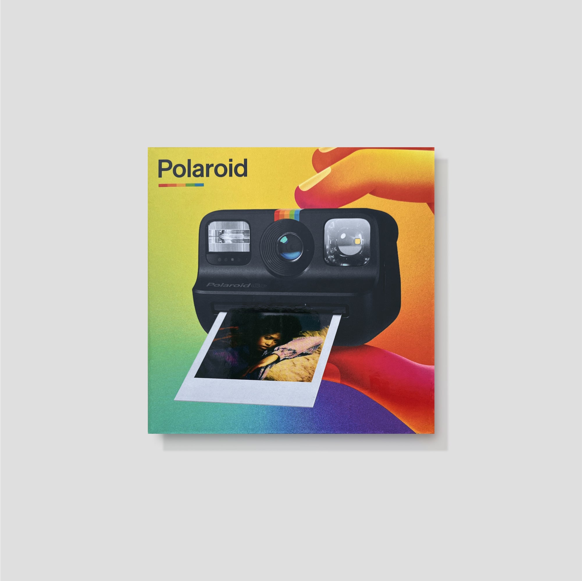 Polaroid Go camera capturing vibrant moments during a travel adventure.
