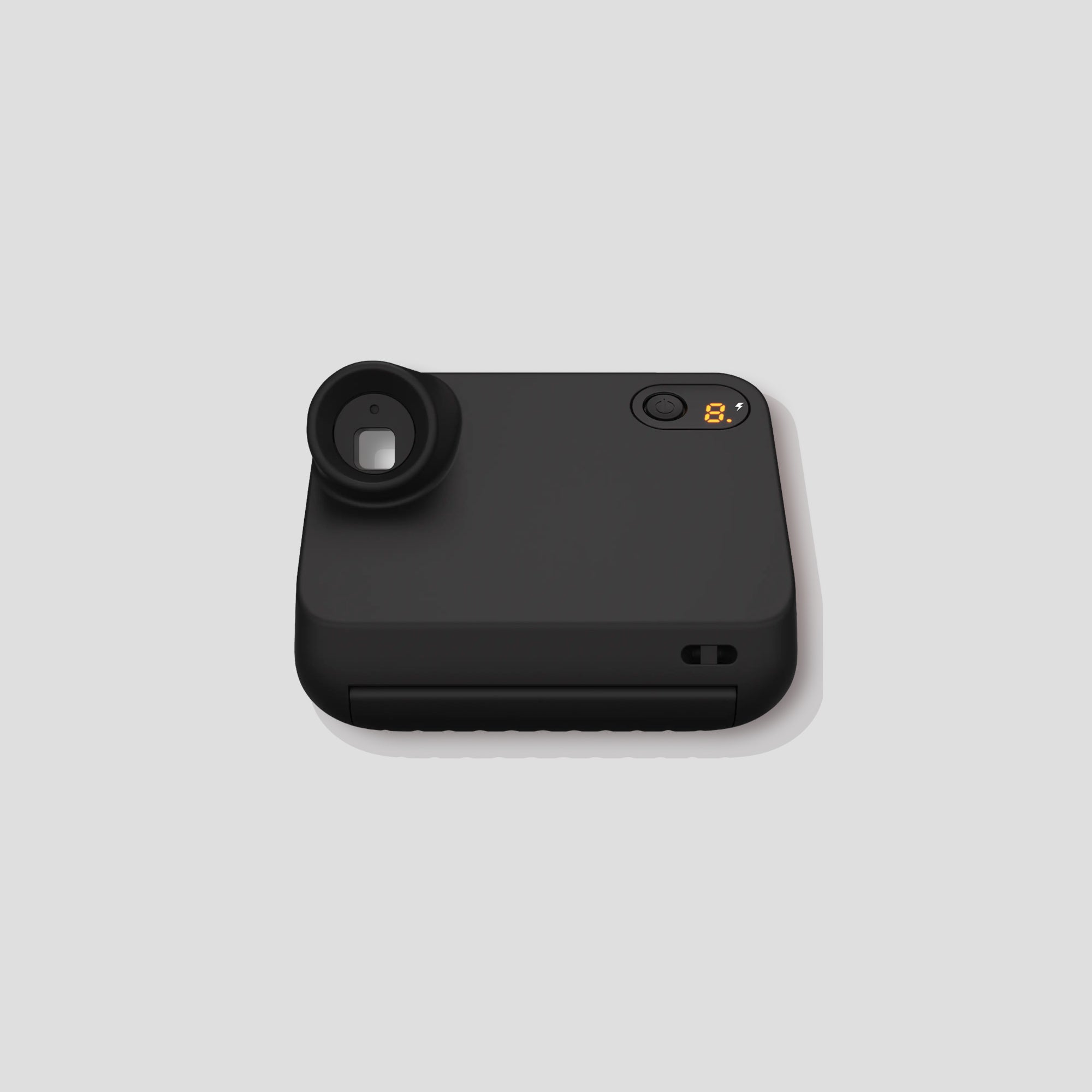 Close-up of the Polaroid Go 2 highlighting its compact size and color filters.