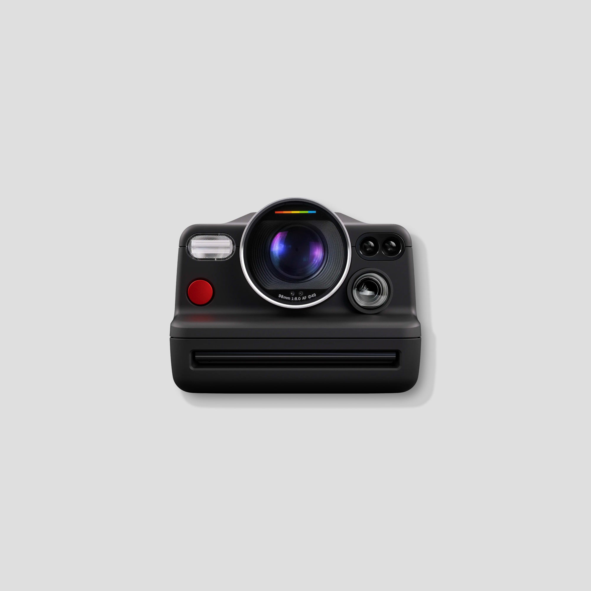 Polaroid I-2 being held by a photographer during an outdoor shoot