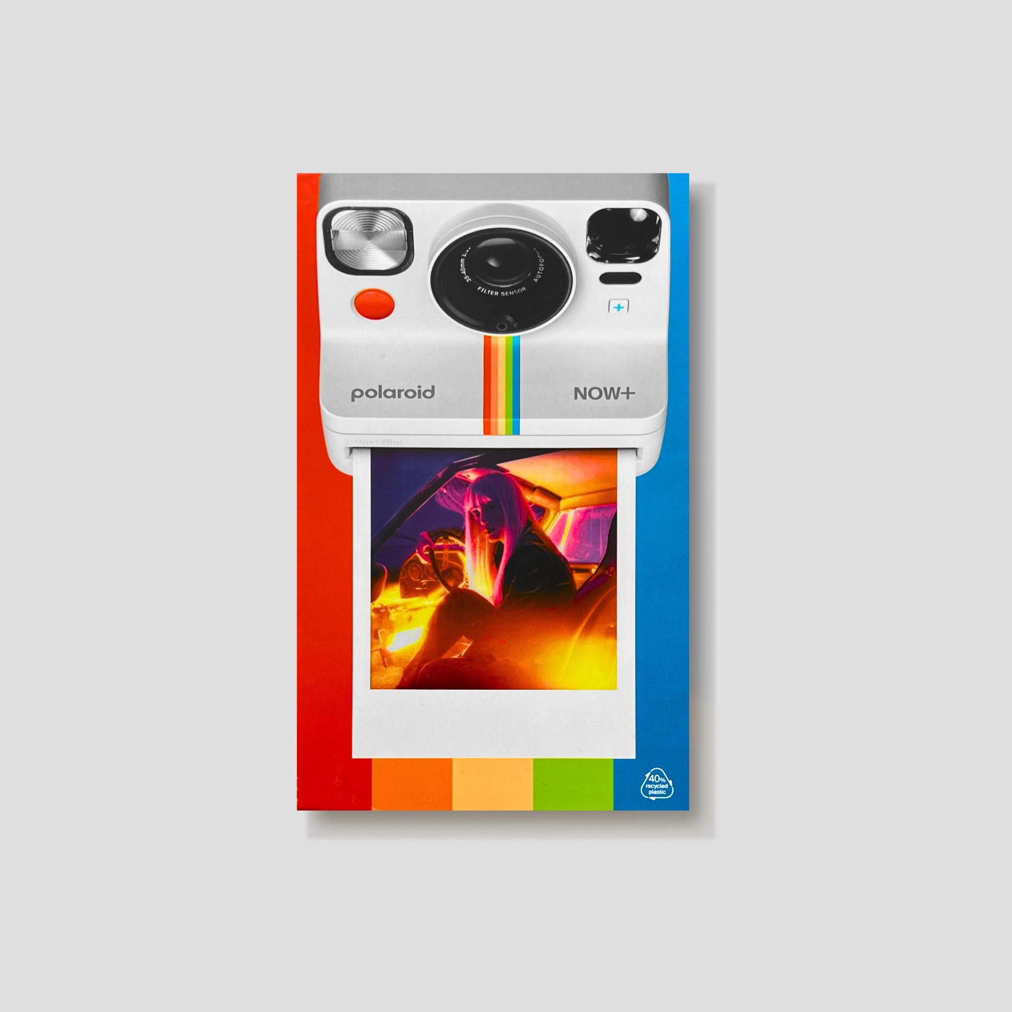 Person using the Polaroid Now+ Gen 2 for instant photo printing outdoors