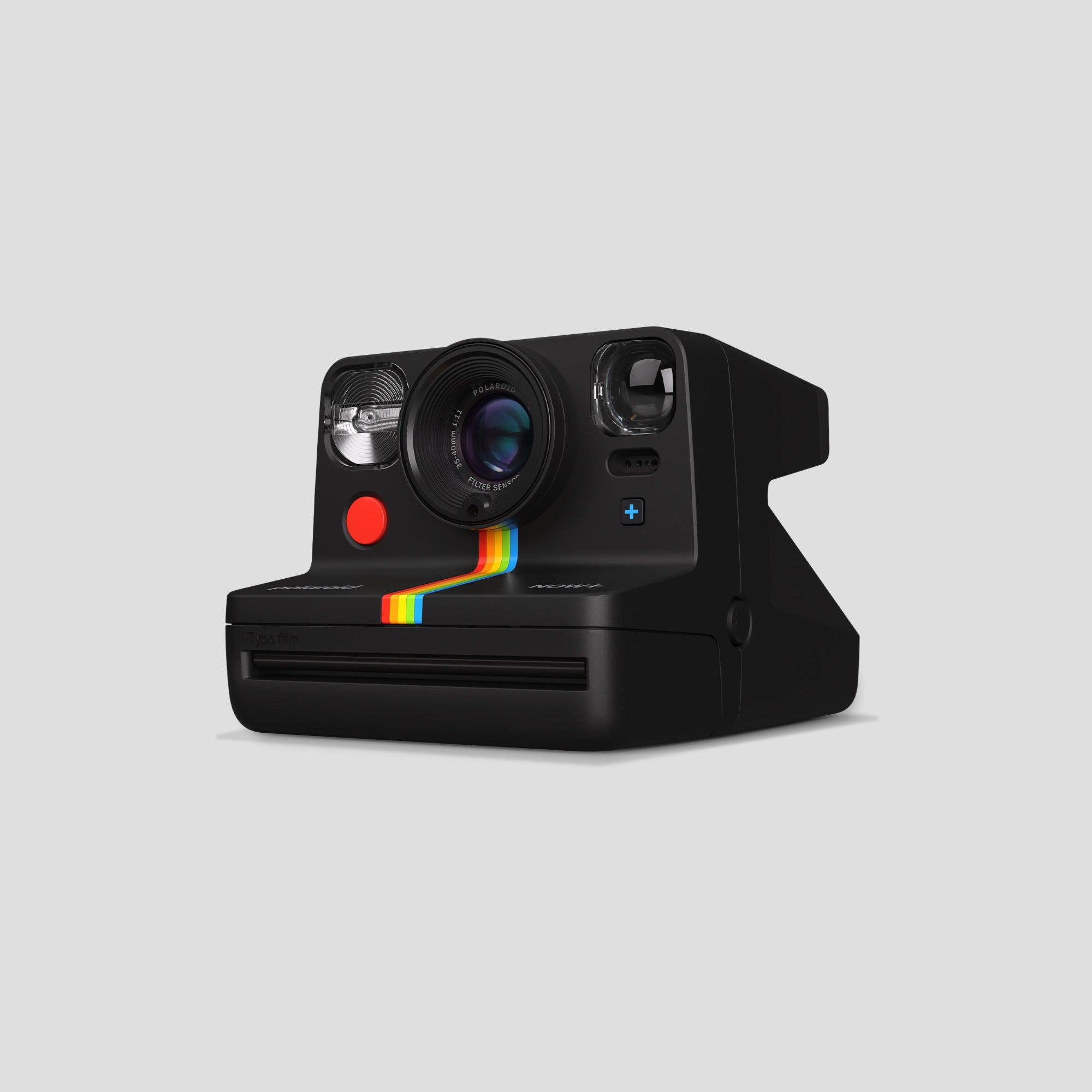 Person using the Polaroid Now+ Gen 2 for instant photo printing outdoors