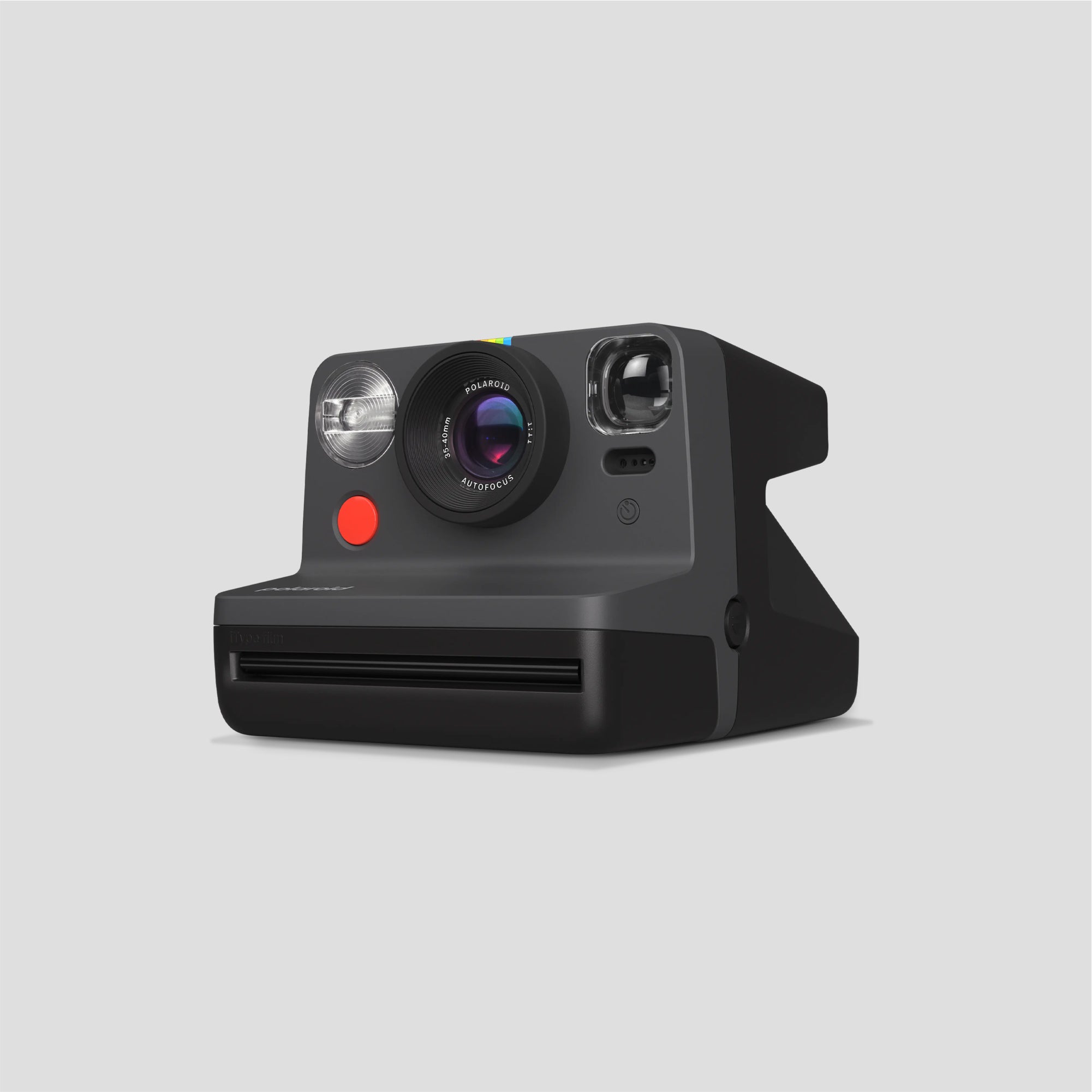 Person using the Polaroid Now Gen 2 to take a spontaneous photo outdoors, highlighting its ease of use for beginners