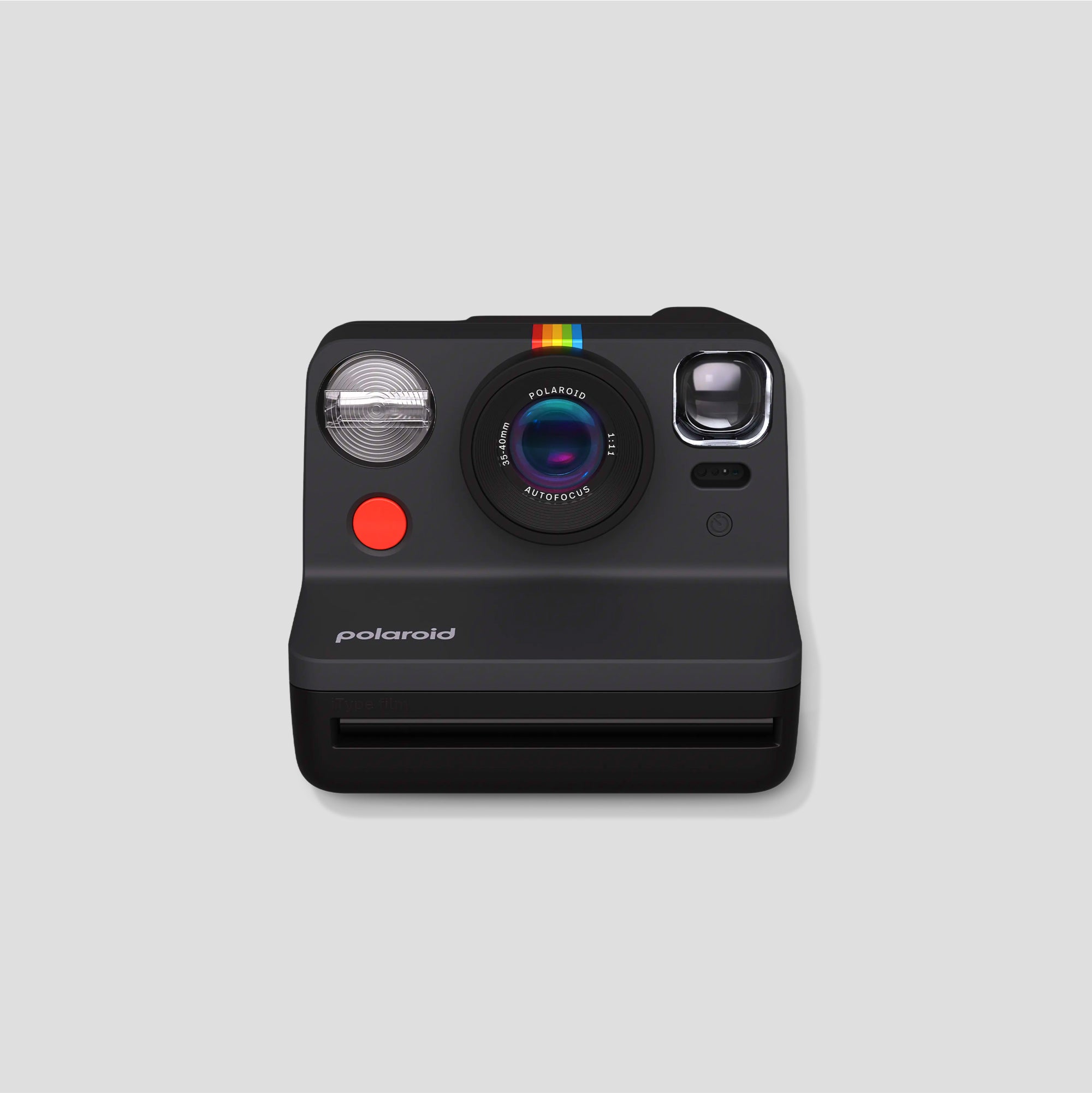 Close-up of the Polaroid film output from the camera, illustrating the instant photo development process