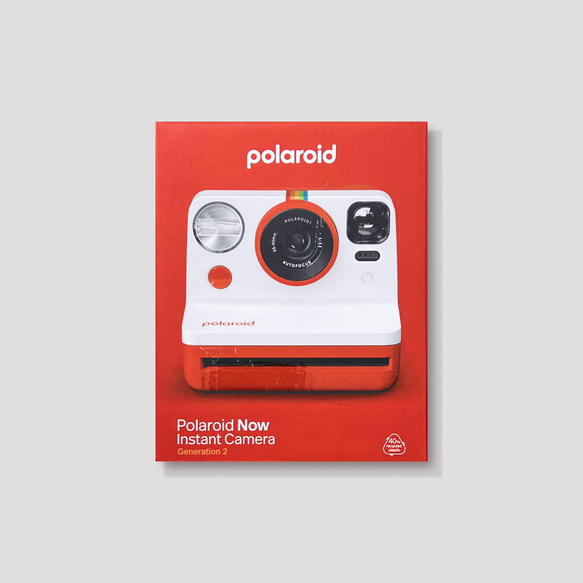 Person holding the Polaroid Now Gen 2 capturing moments outdoors