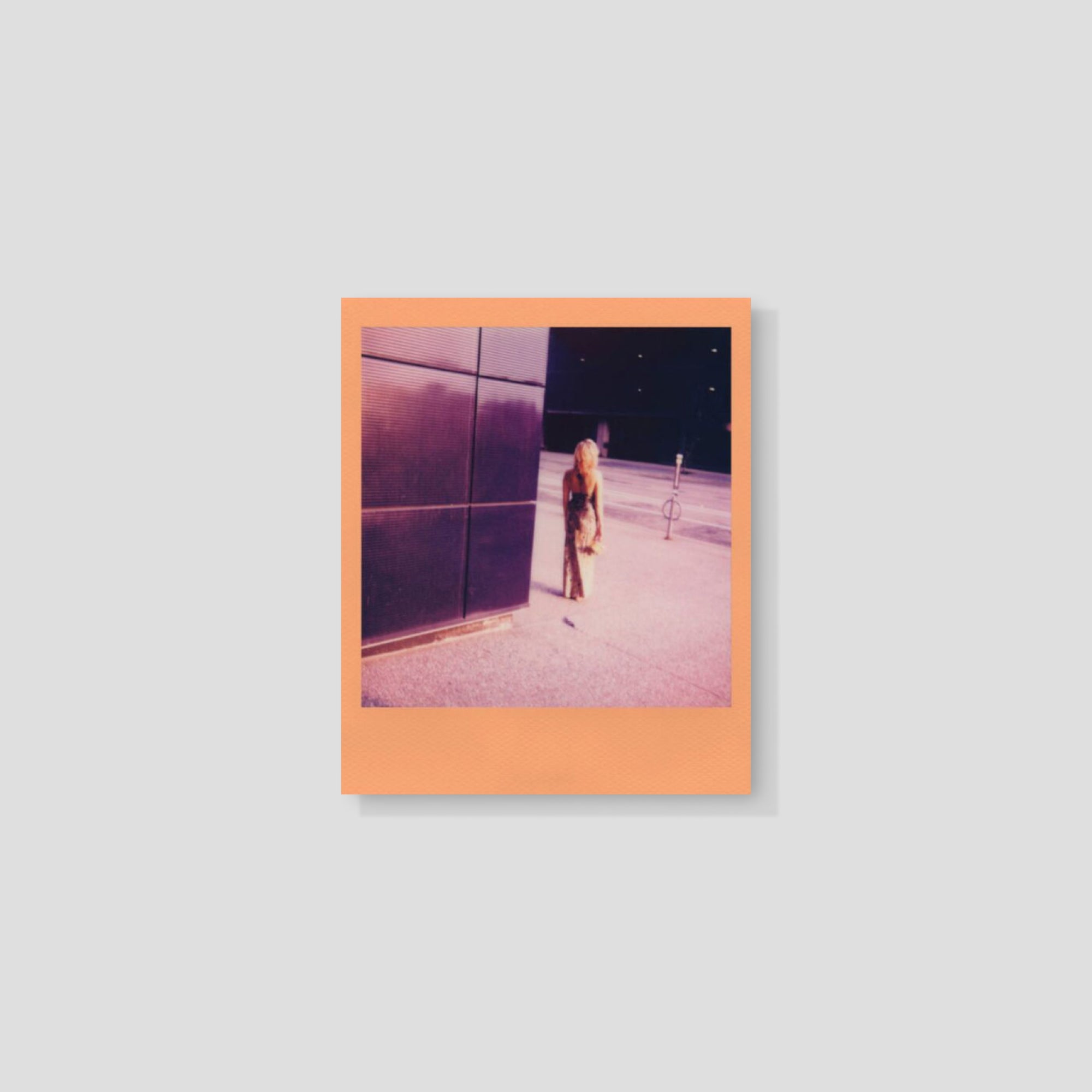 A collection of instant photos taken with Polaroid Peach Fuzz film, showcasing the color quality.