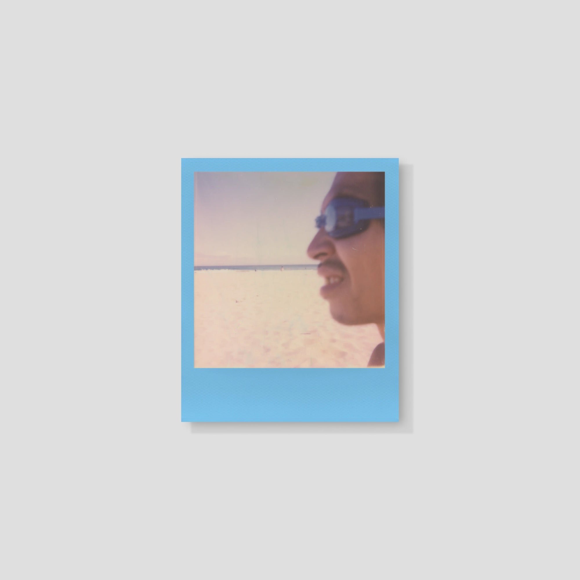 Display of Polaroid photos taken with summer edition film.
