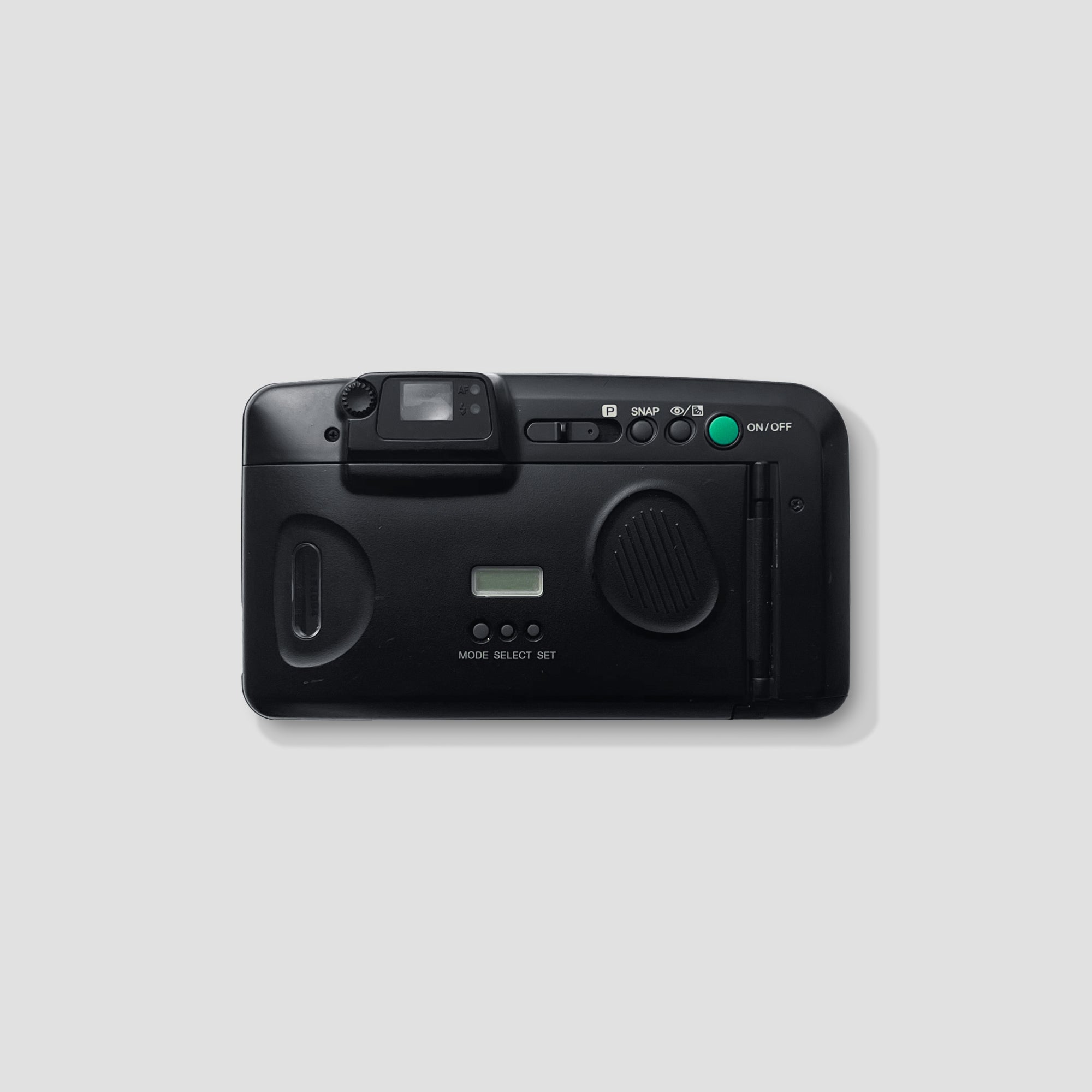 Revue 1200 AF-D zoom lens mounted on a camera for outdoor photography