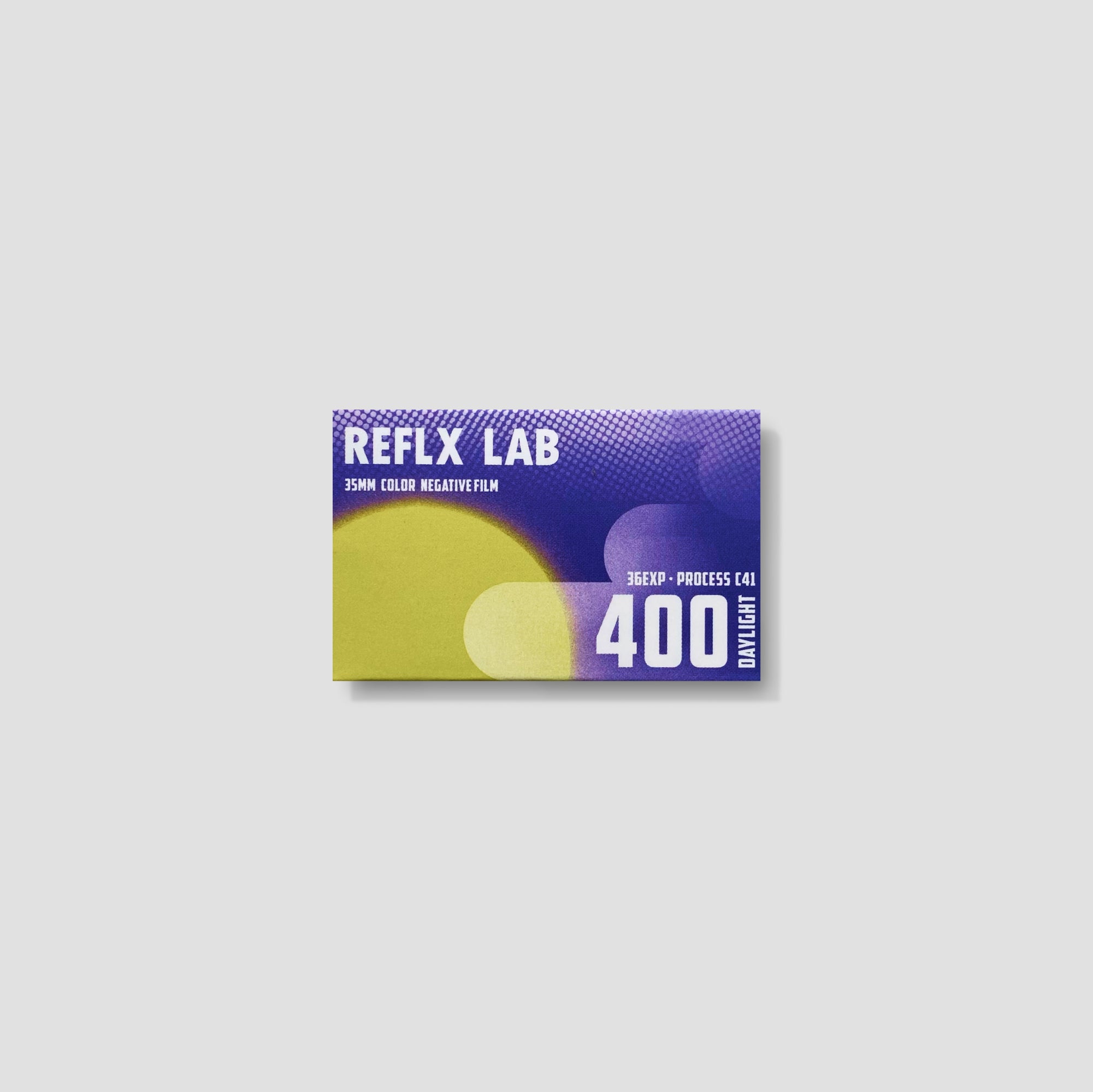 Close-up of Reflx Lab 400D 35mm film roll with vibrant colors