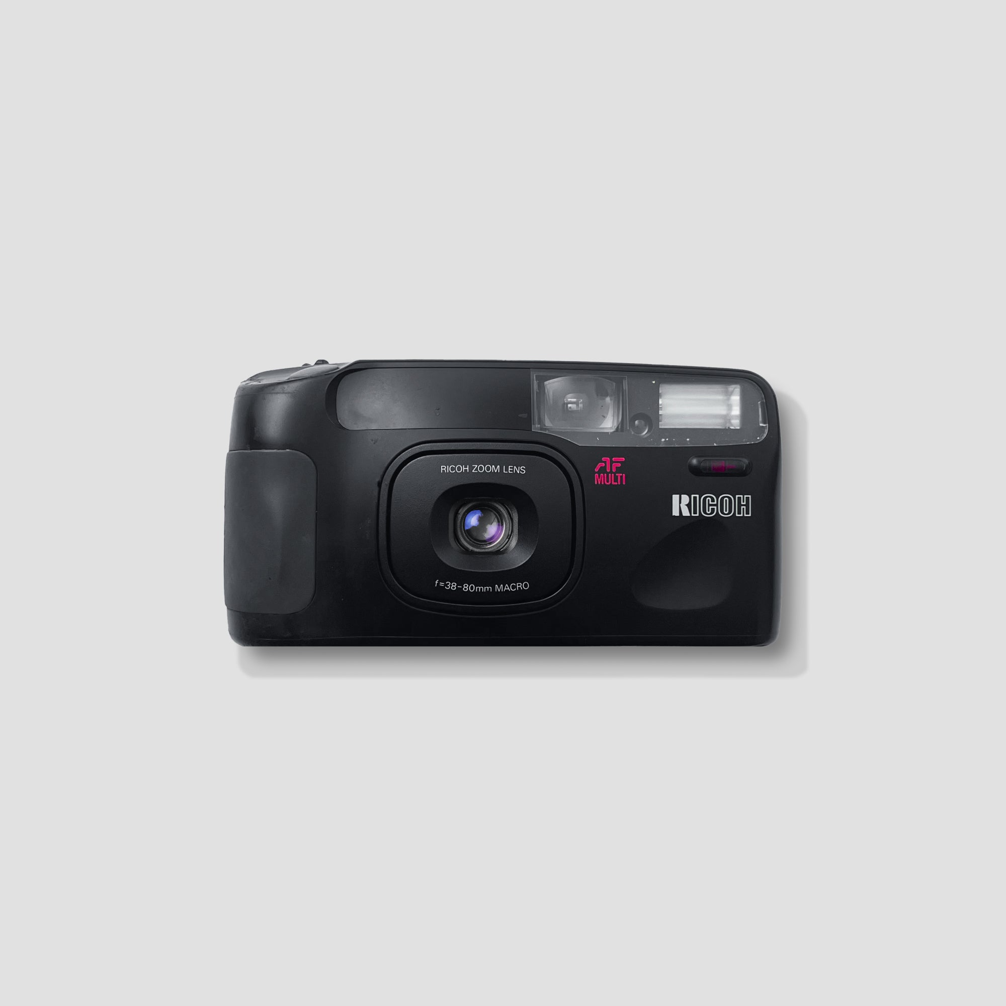 Ricoh RZ-800 film camera showing macro lens and flash features.