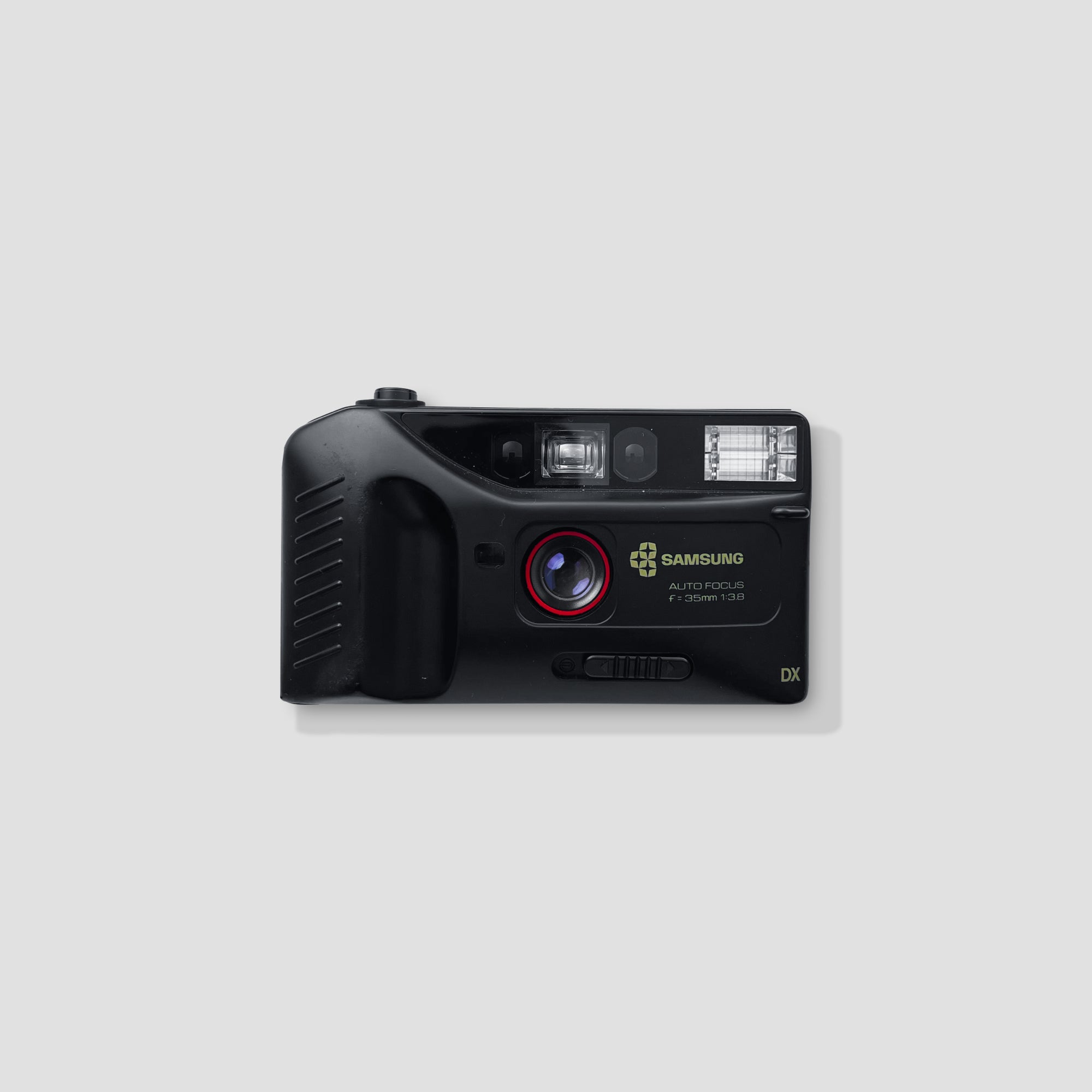 Front view of the Samsung AF 300, showcasing its lightweight design and 35mm lens.