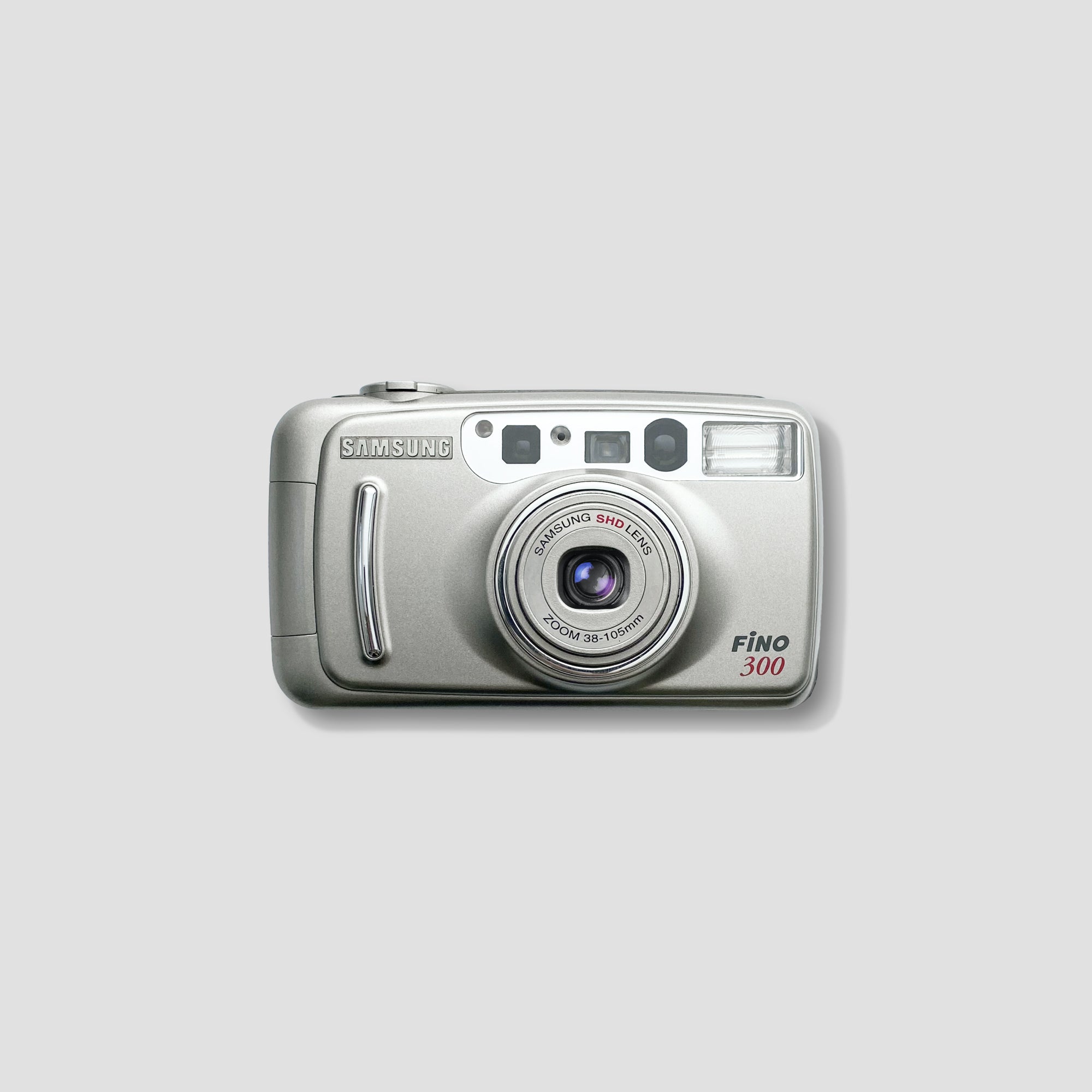 Front view of Samsung Fino 300 compact camera with zoom lens