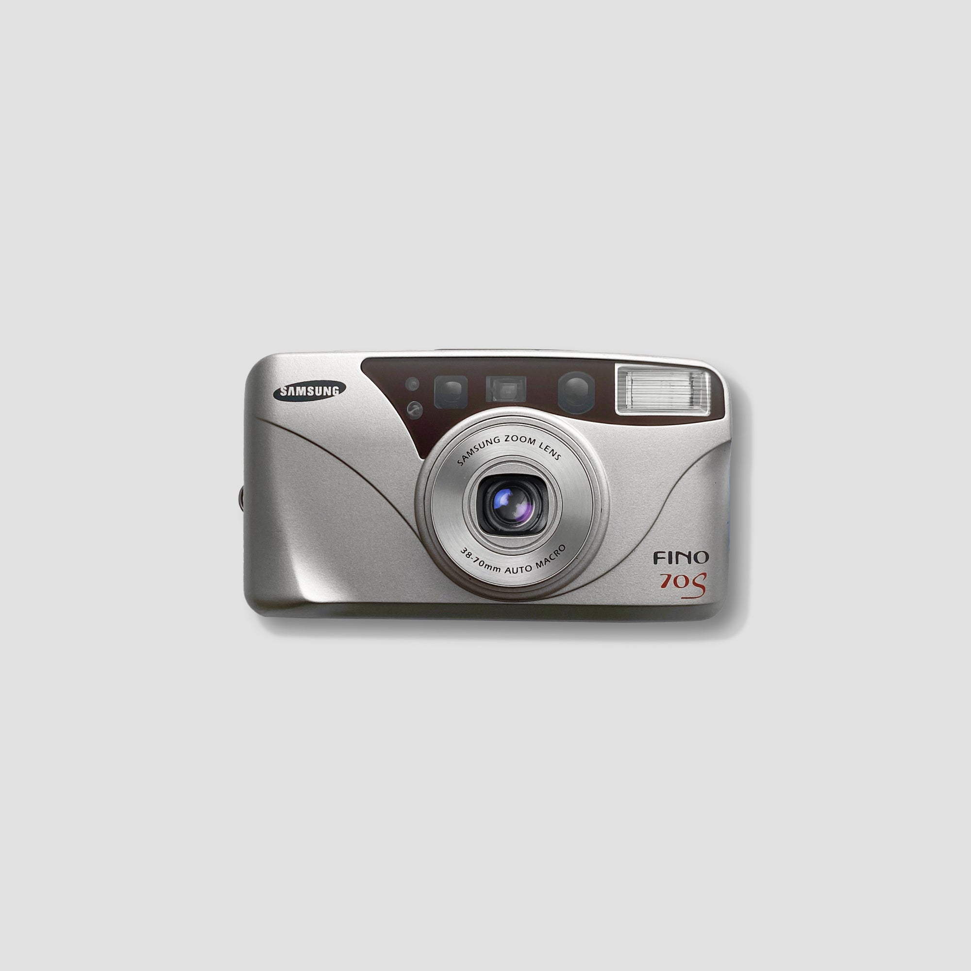 Samsung Fino 70s compact film camera from the front, showcasing its sleek design.