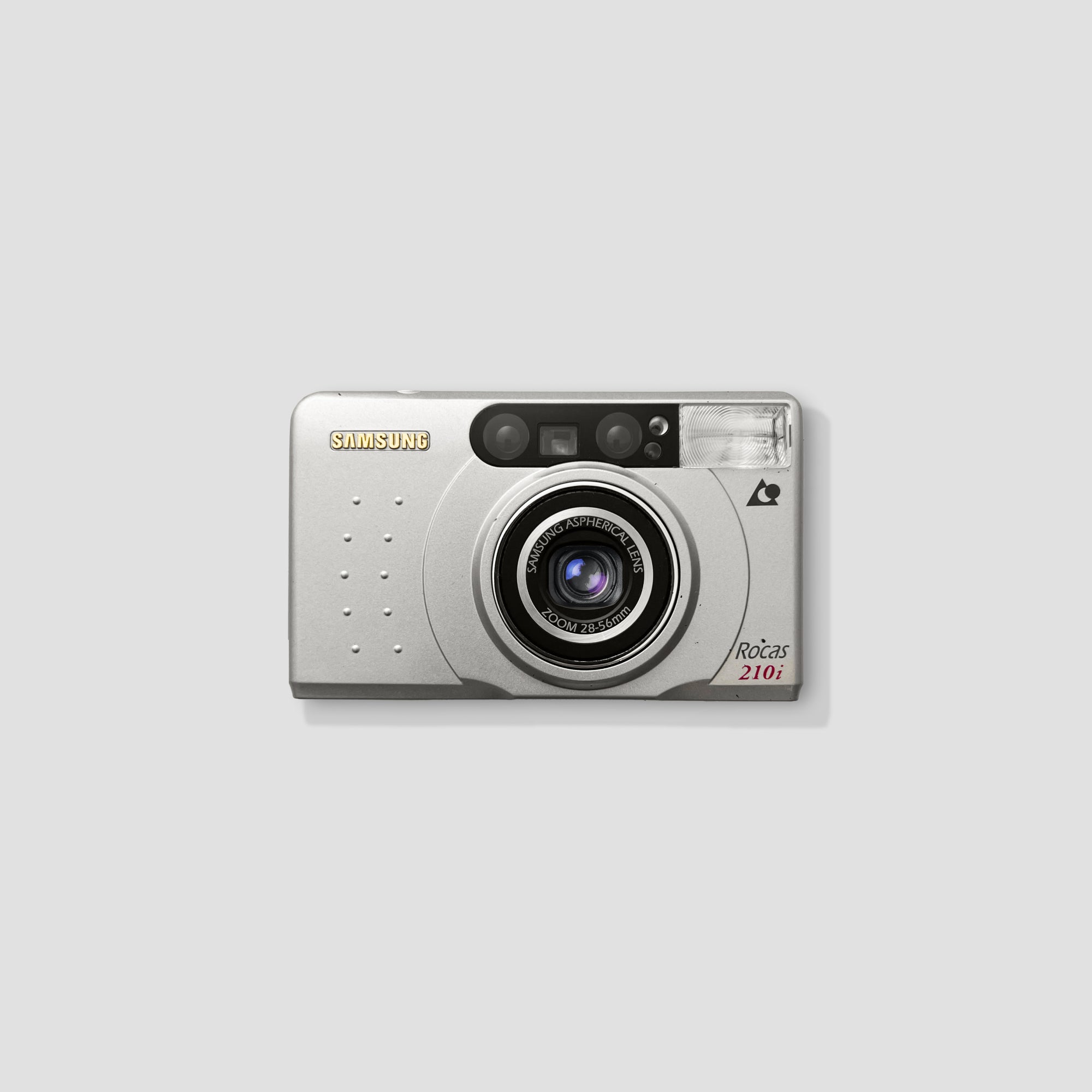 Samsung Rocas 210i film camera showing its auto-focus lens and compact design
