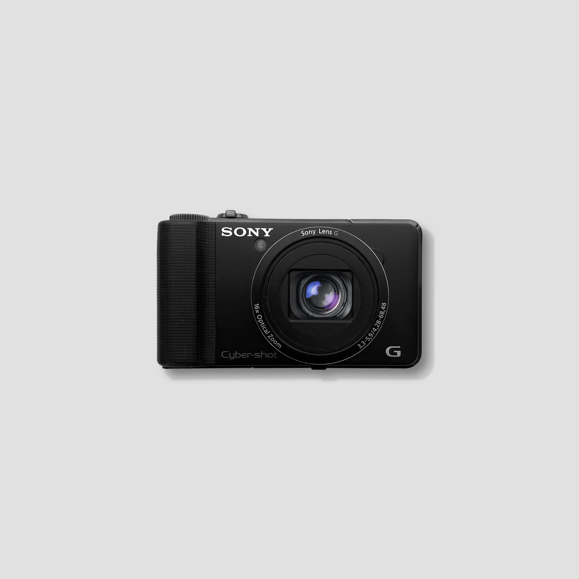Close-up of the Sony Cybershot DSC HX9V showcasing the 16.2MP sensor and sleek design.