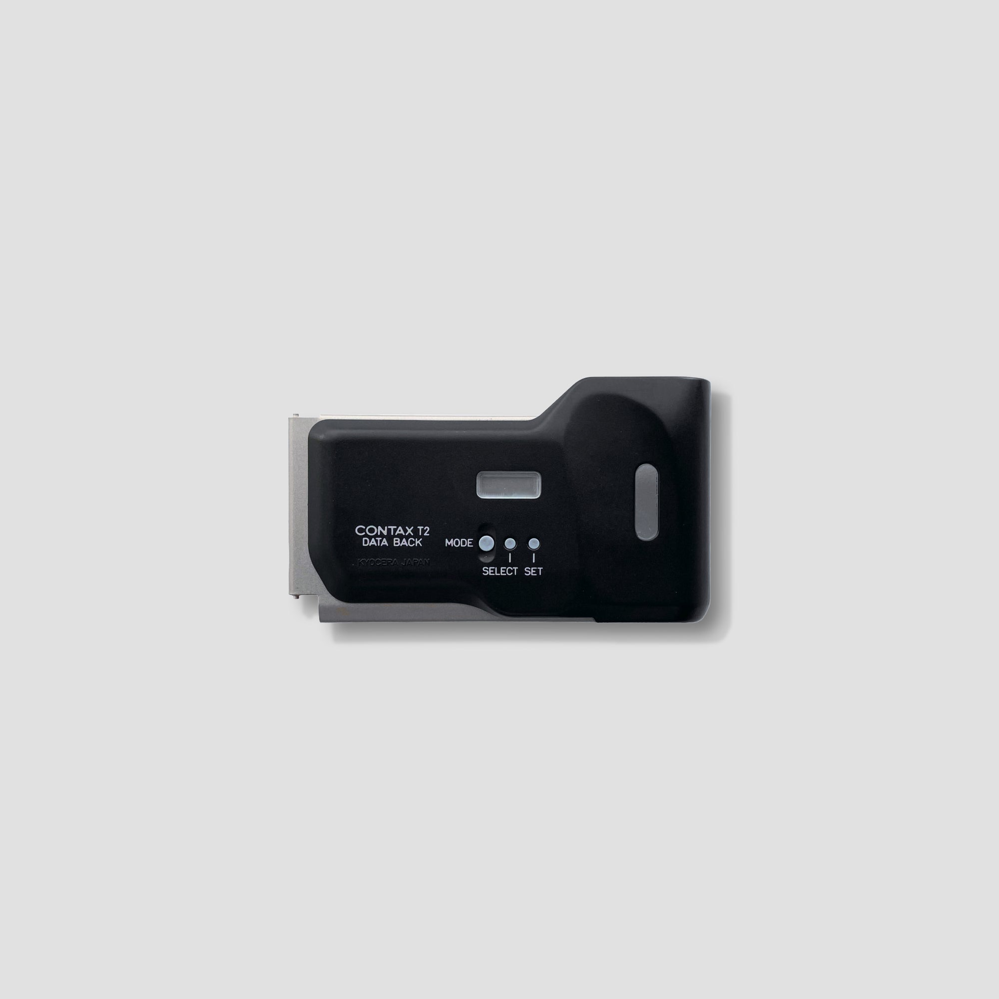 Contax T2 Data Back attached to a vintage film camera, showcasing the imprinting feature