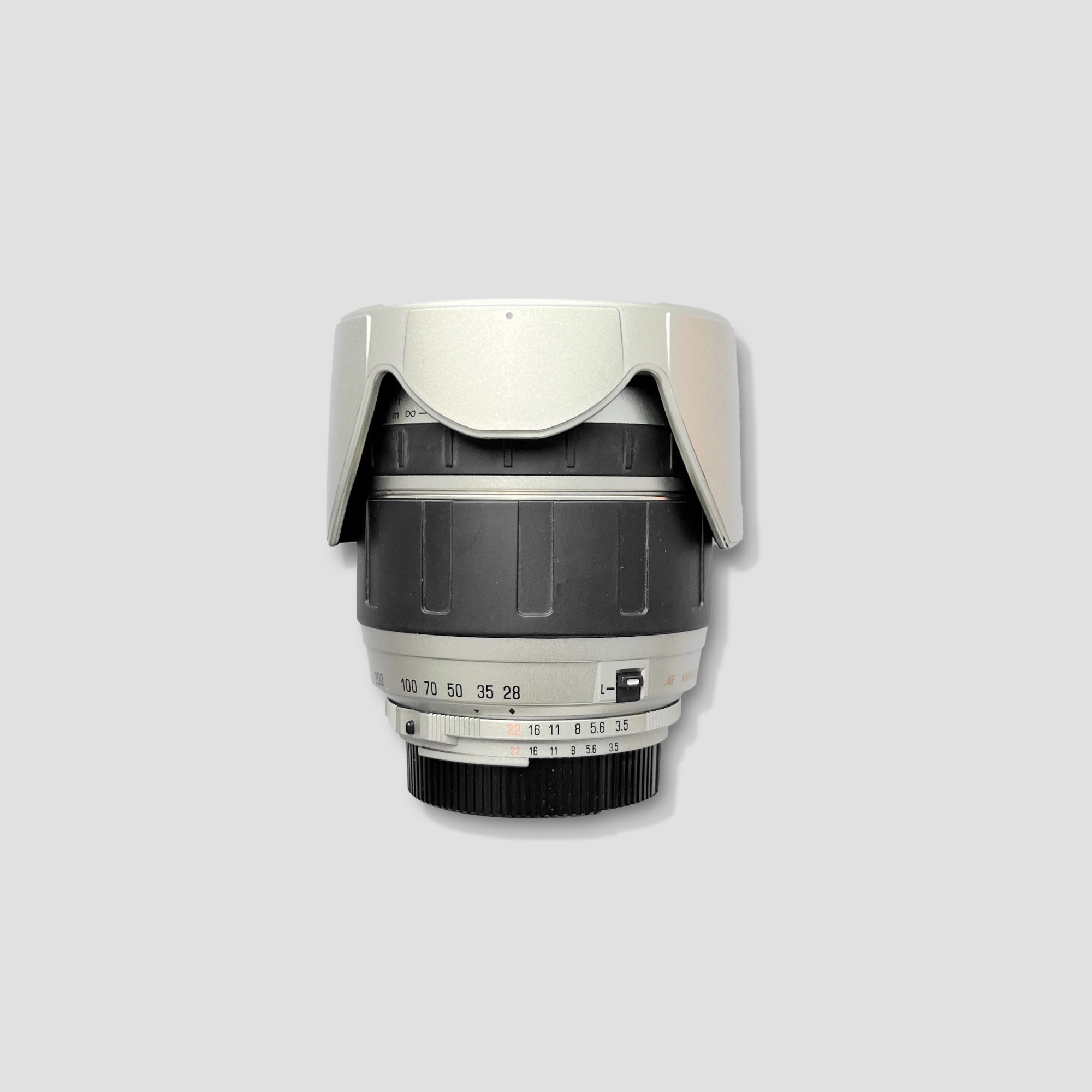 Photographer using Tamron 28-300mm lens outdoors for wildlife photography