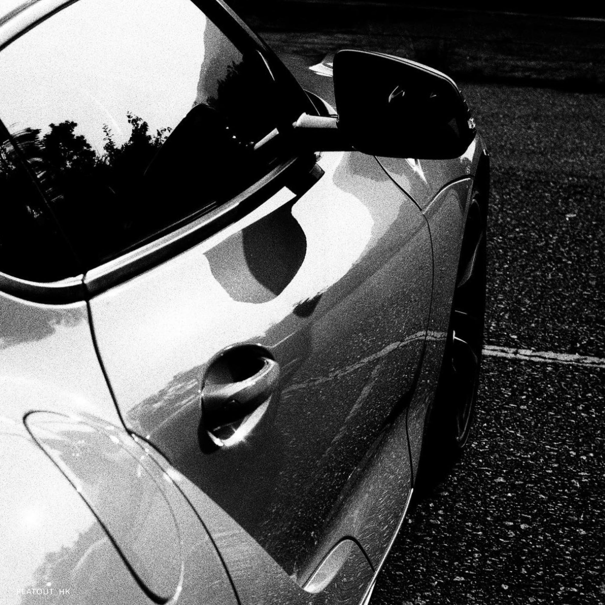 Photographer using Yashica Mono 400 film outdoors in natural light