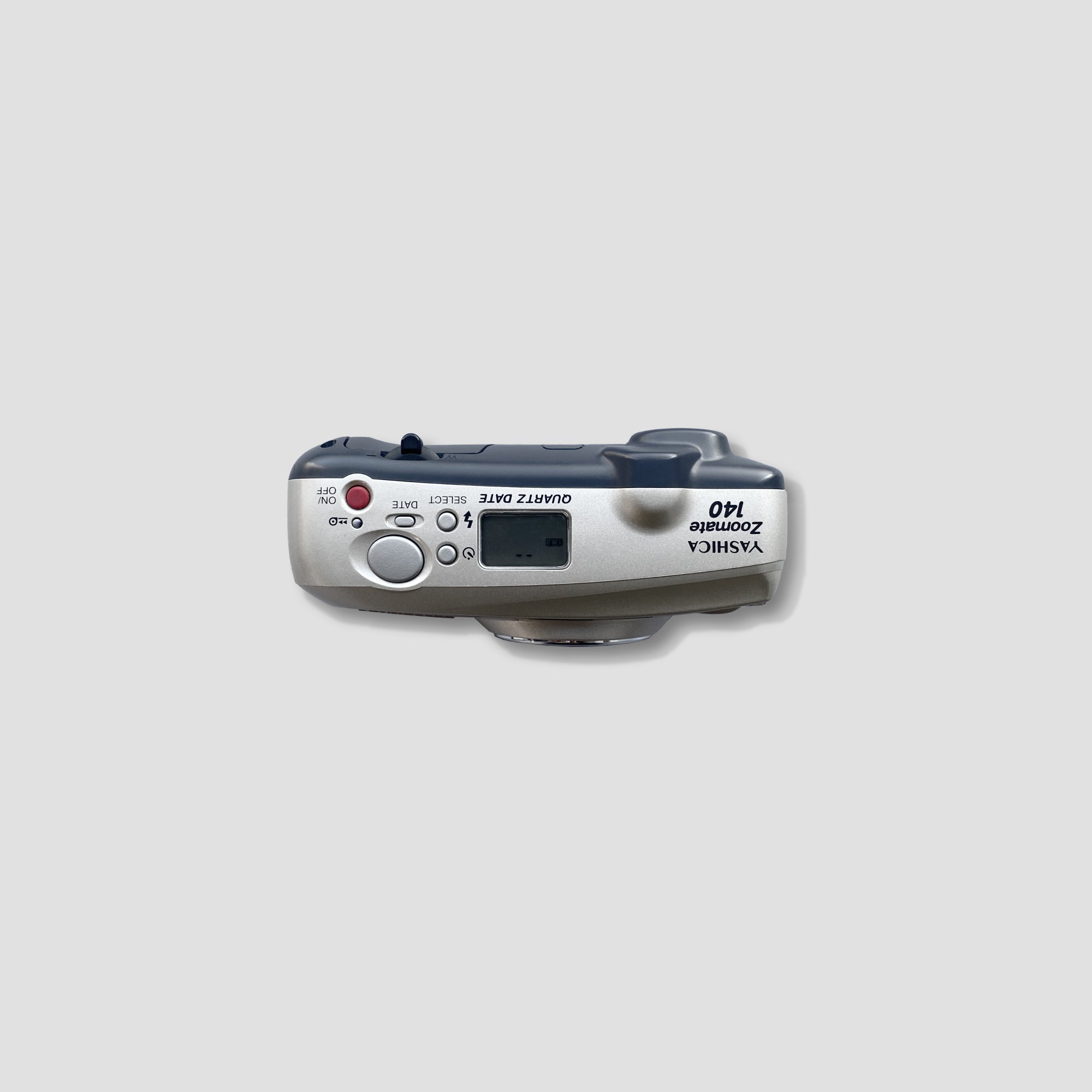 Close-up of Yashica Zoomate 140 camera showing built-in flash and controls