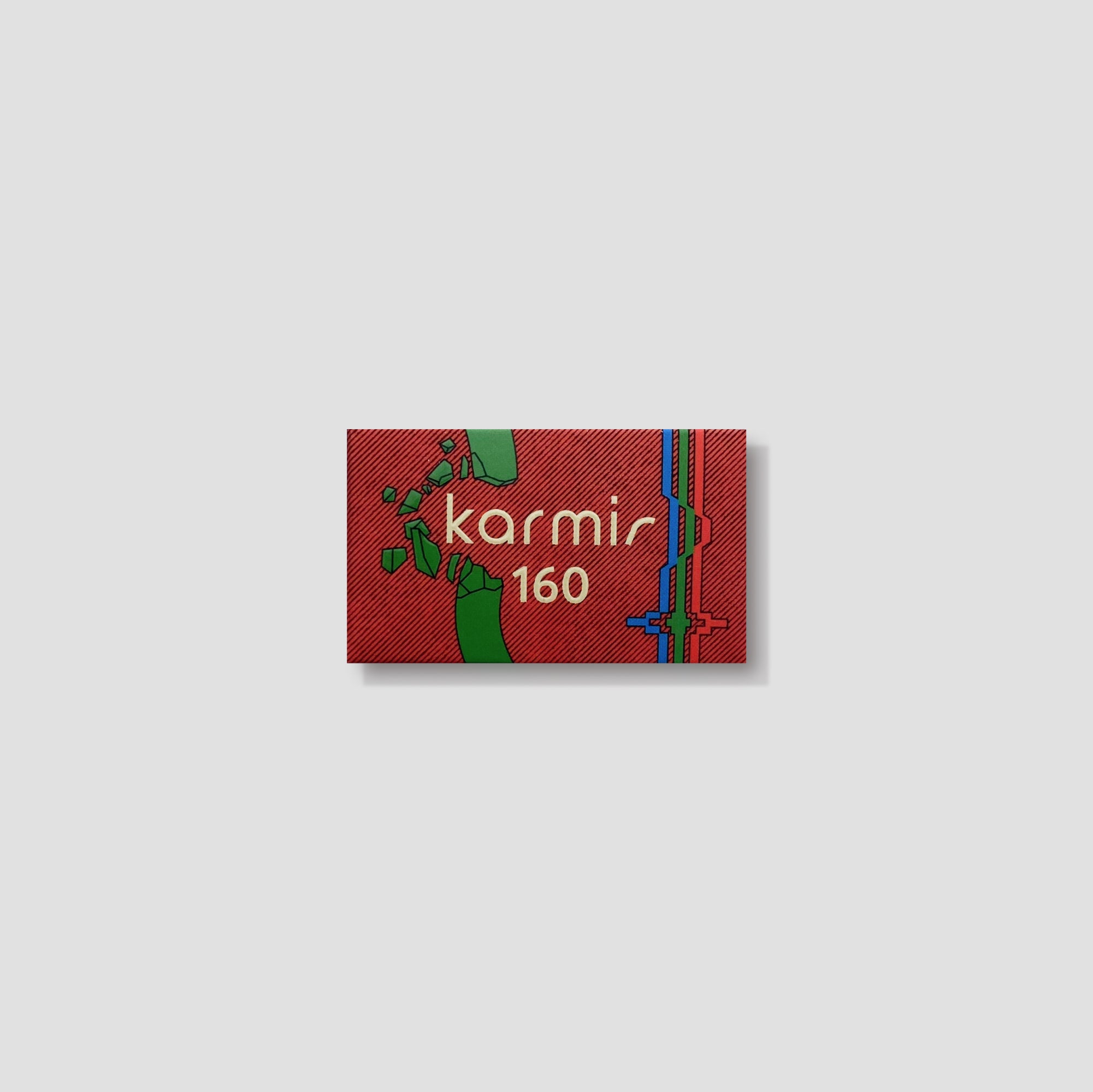 Karmir 160 color film roll on a photography table, showcasing high dynamic range