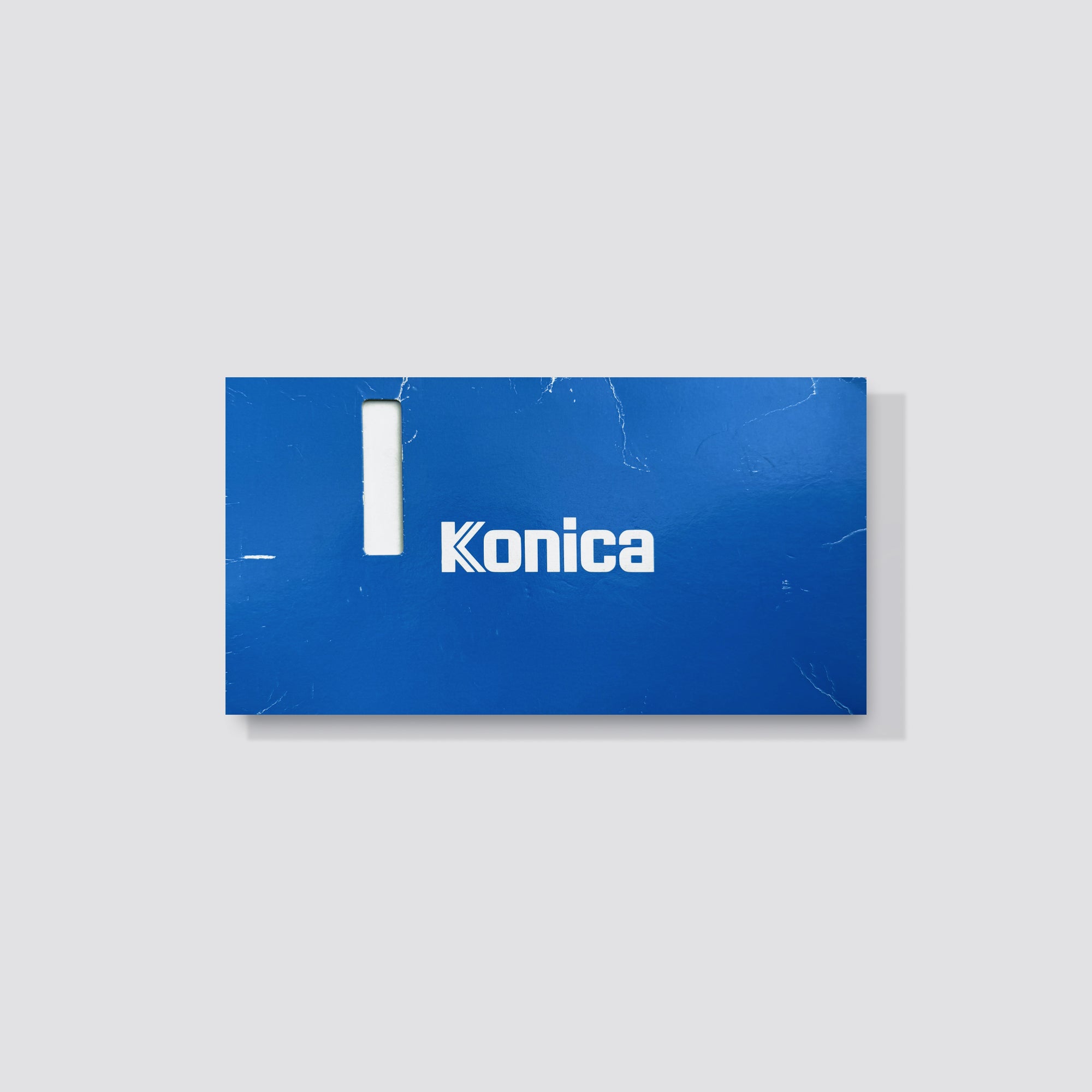 Side angle of the Konica Big Mini BM-311Z showing its compact size and stylish design