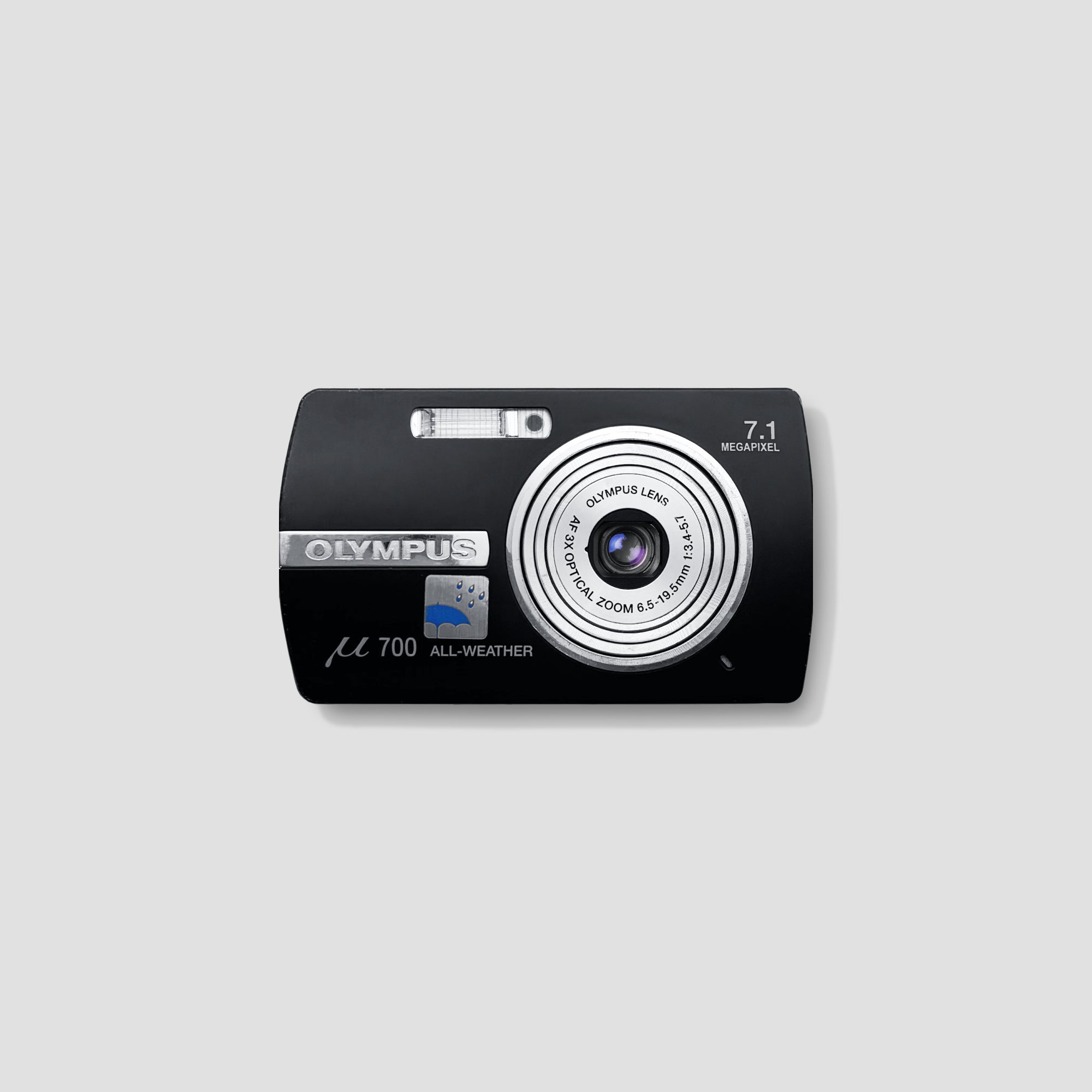 Olympus MJU Digital 700 in outdoor setting, highlighting weatherproof design