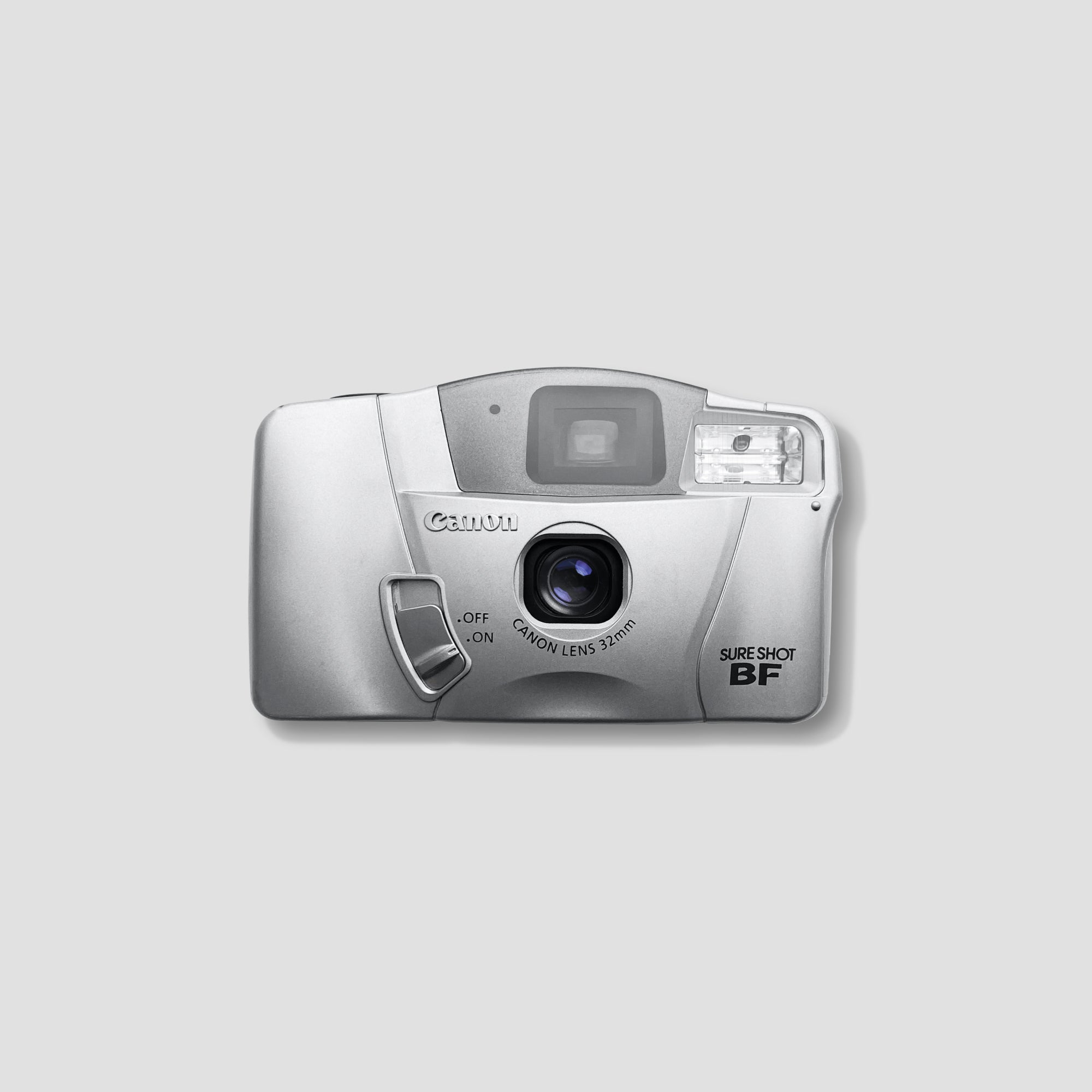Front view of Canon Sure Shot BF showcasing its compact design and oversized viewfinder.