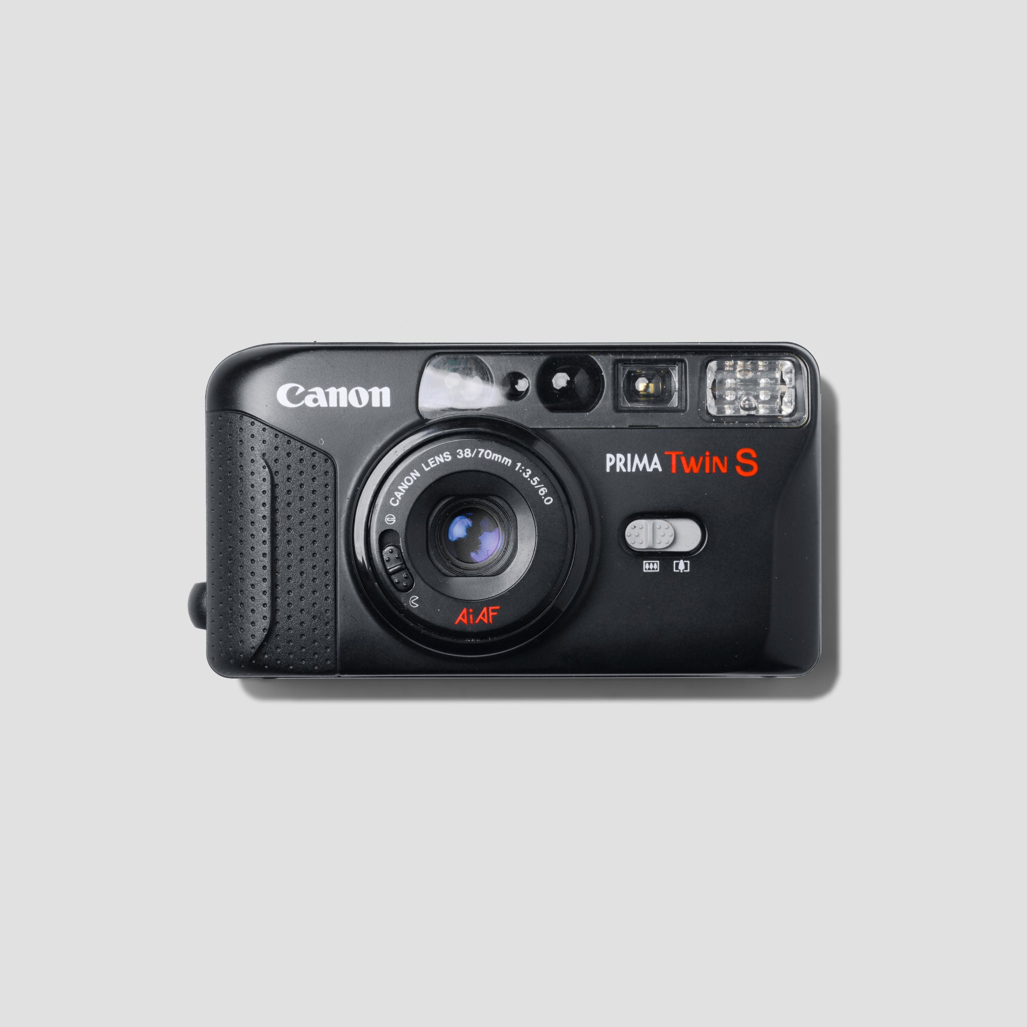 Canon Prima Twin S camera front view showing twin lenses and autofocus system