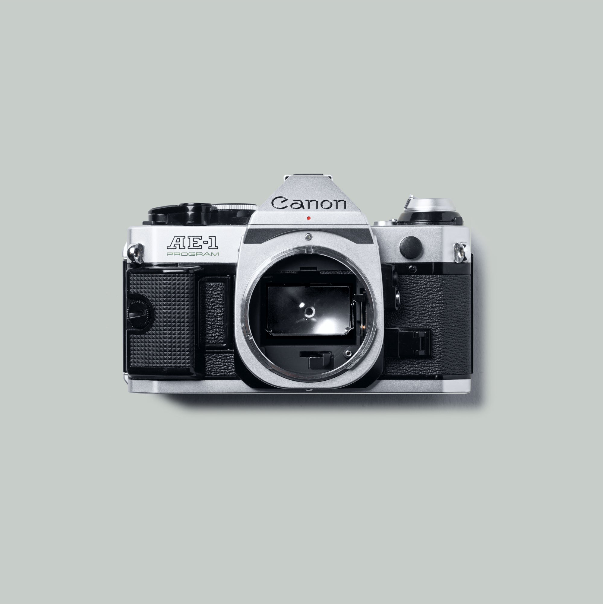 Front view of Canon AE-1 Program 35mm film camera with lens attached