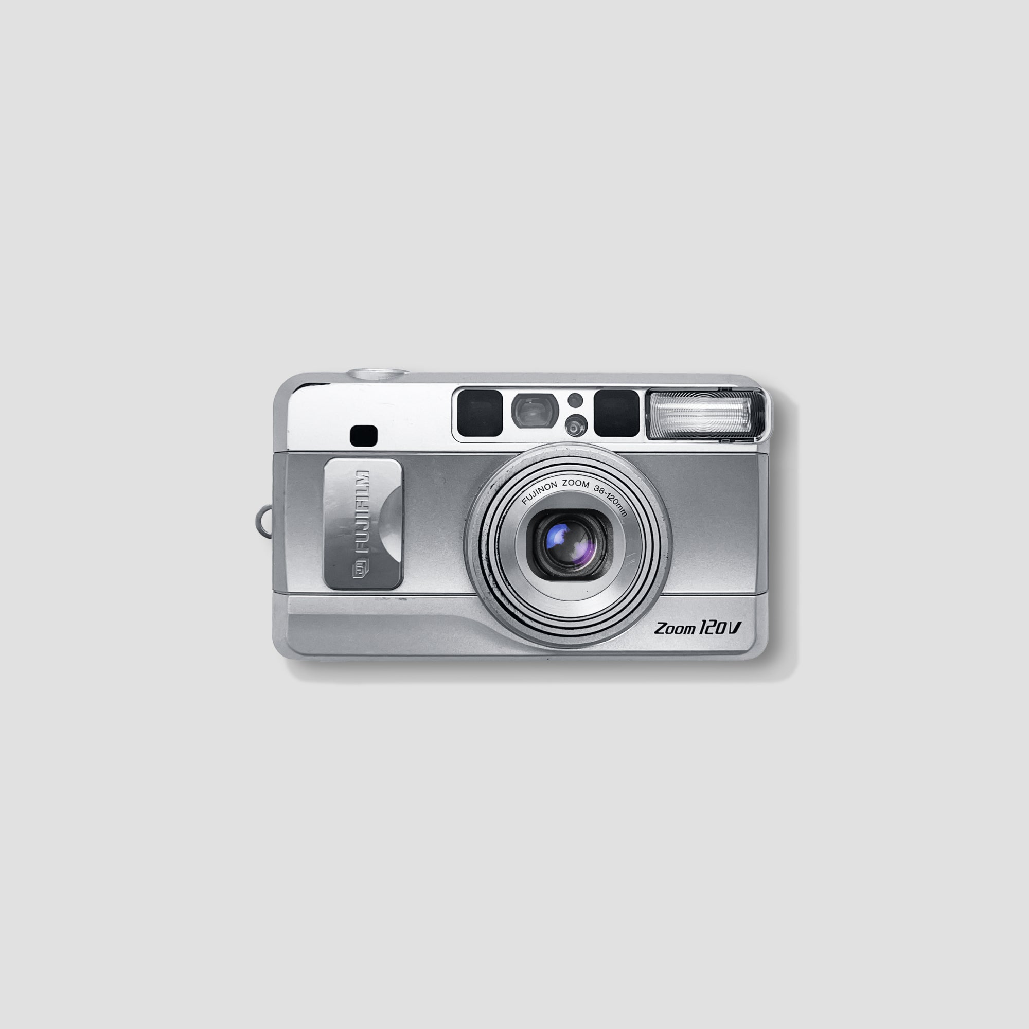 Fujifilm Zoom Date 120V camera angled view highlighting the 38-120mm lens.