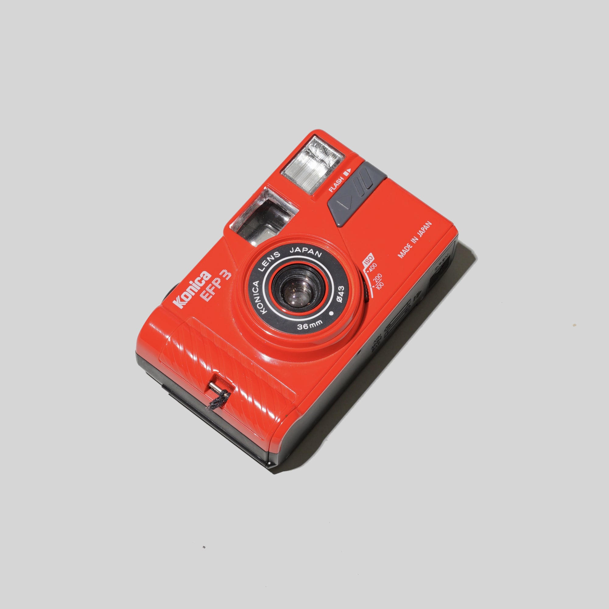 Front view of the Konica EFP 3 compact film camera showcasing its sleek design and large viewfinder.