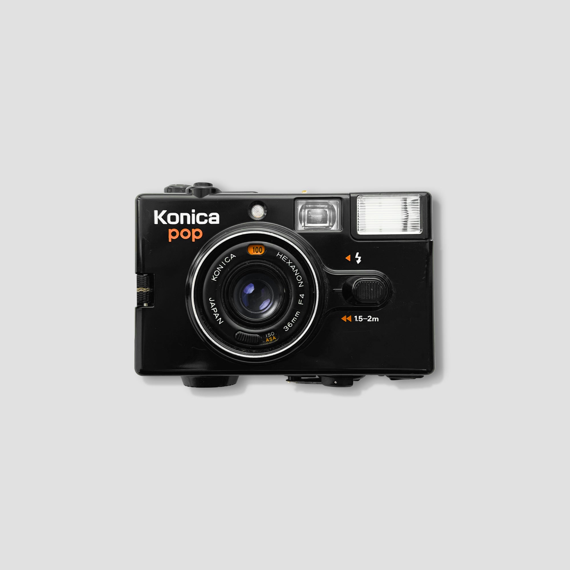 Konica Pop Black 35mm film camera front view with flash