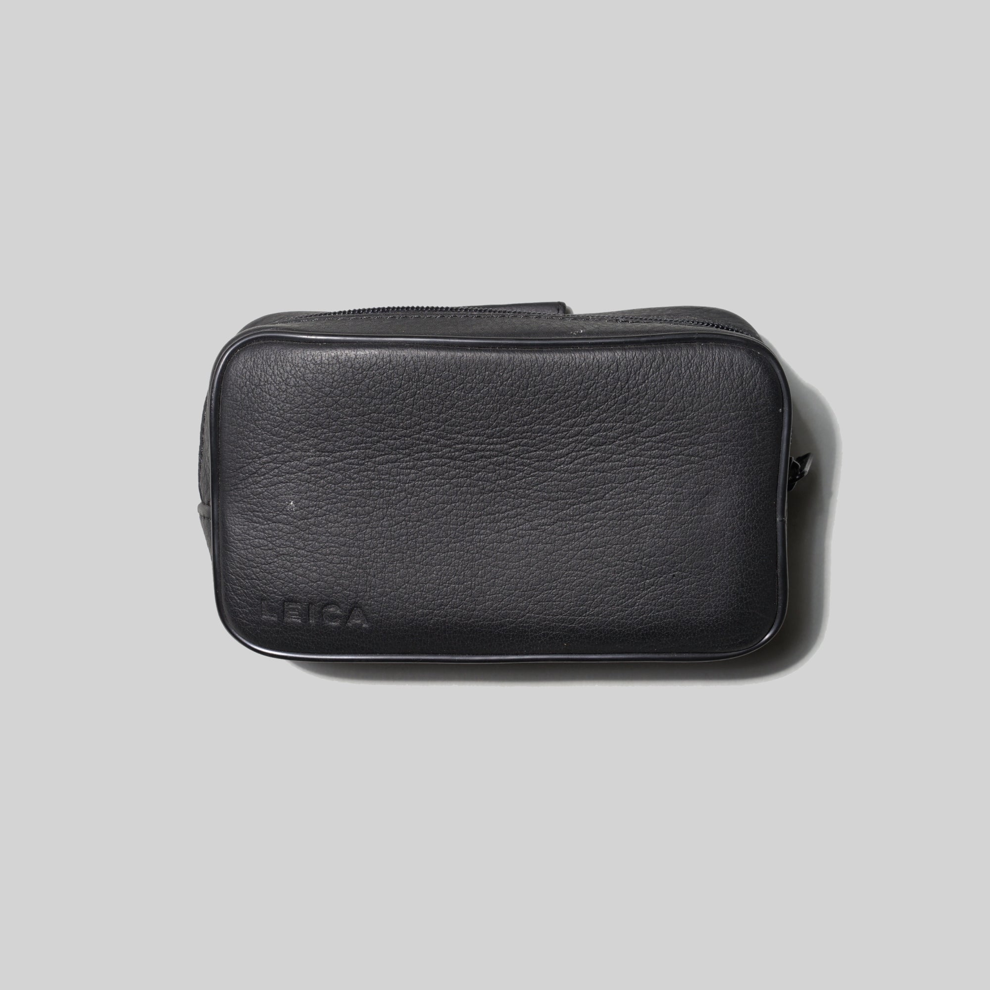 Leica Mini Z2X camera in a premium camera bag, showing interior padding and secure zipper