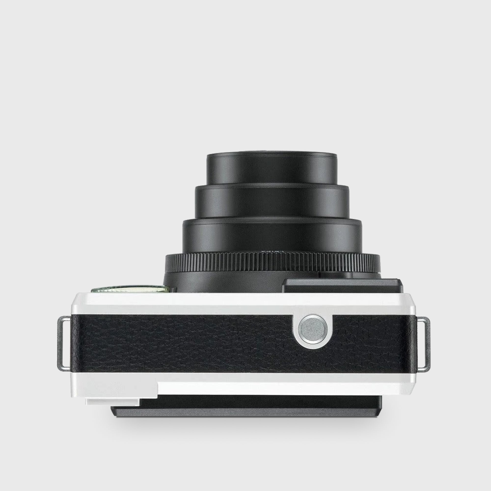 Leica Sofort in action at a lively party, capturing fun moments